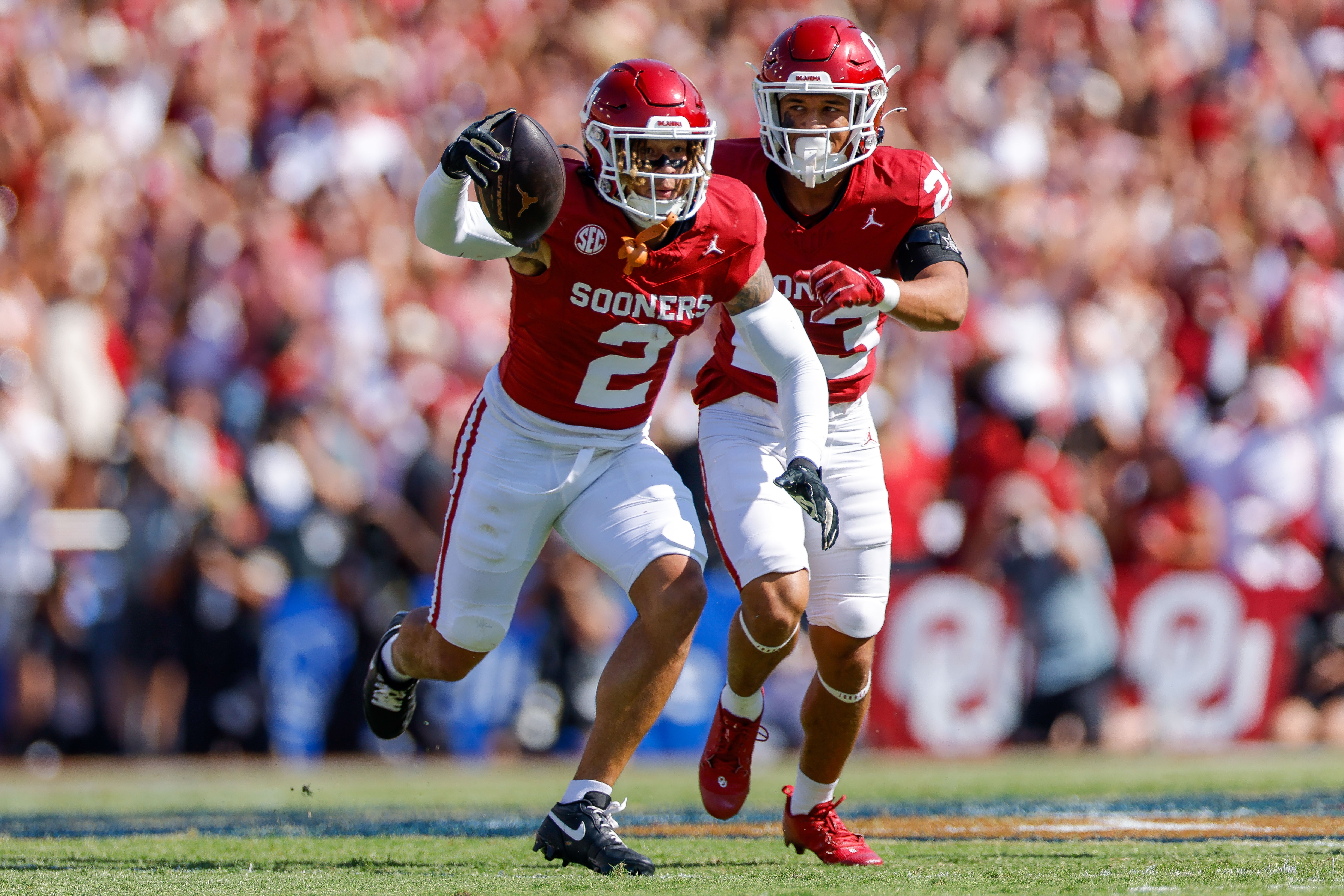Oct 12, 2024; Dallas, Texas, USA; Oklahoma Sooners defensive back Billy Bowman Jr. (2) intercepts a pass during the first quarter against the Texas Longhorns at the Cotton Bowl.