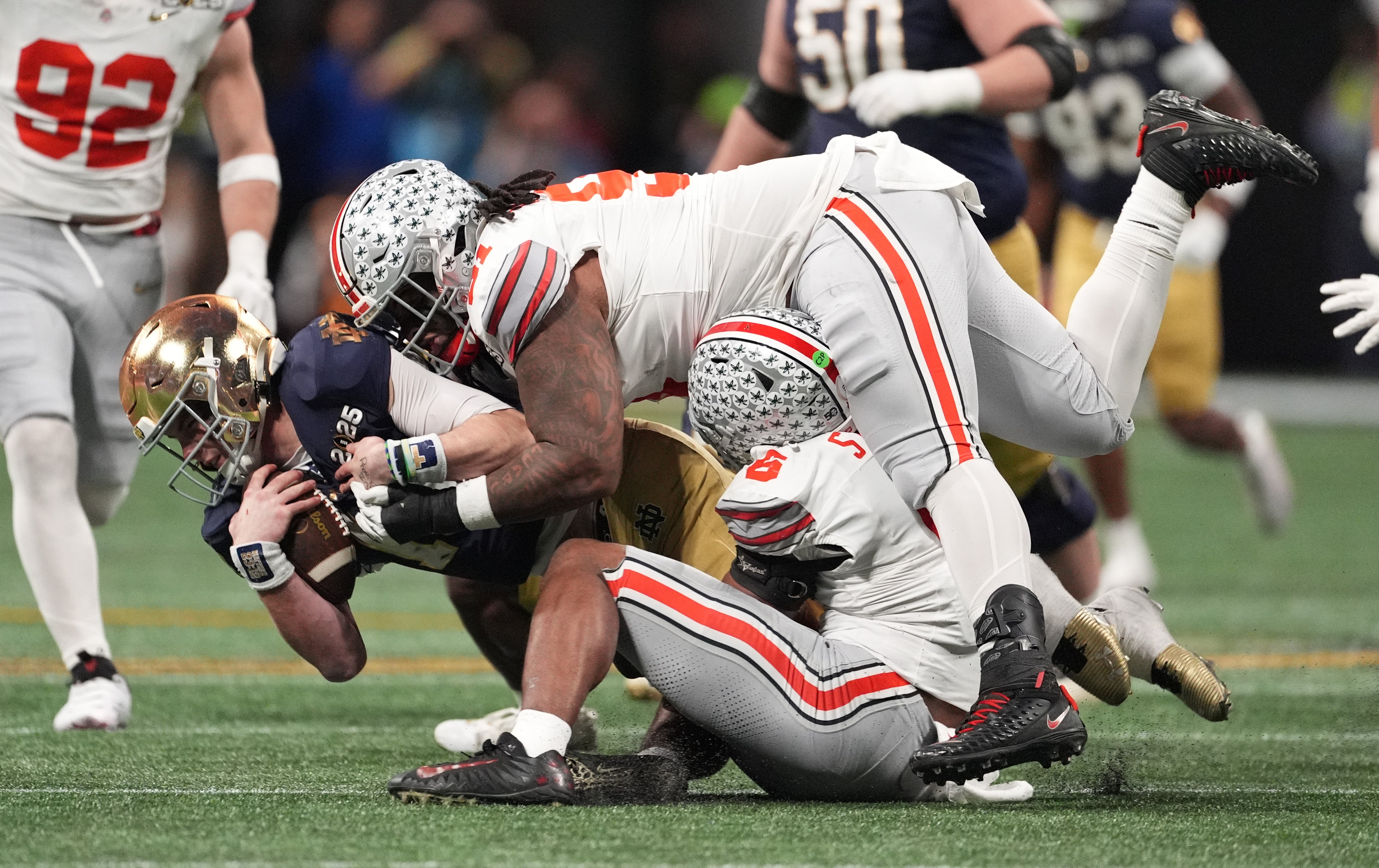 Tyleik Williams, DL Ohio State makes a tackle on a Notre Dame player in the national championship game