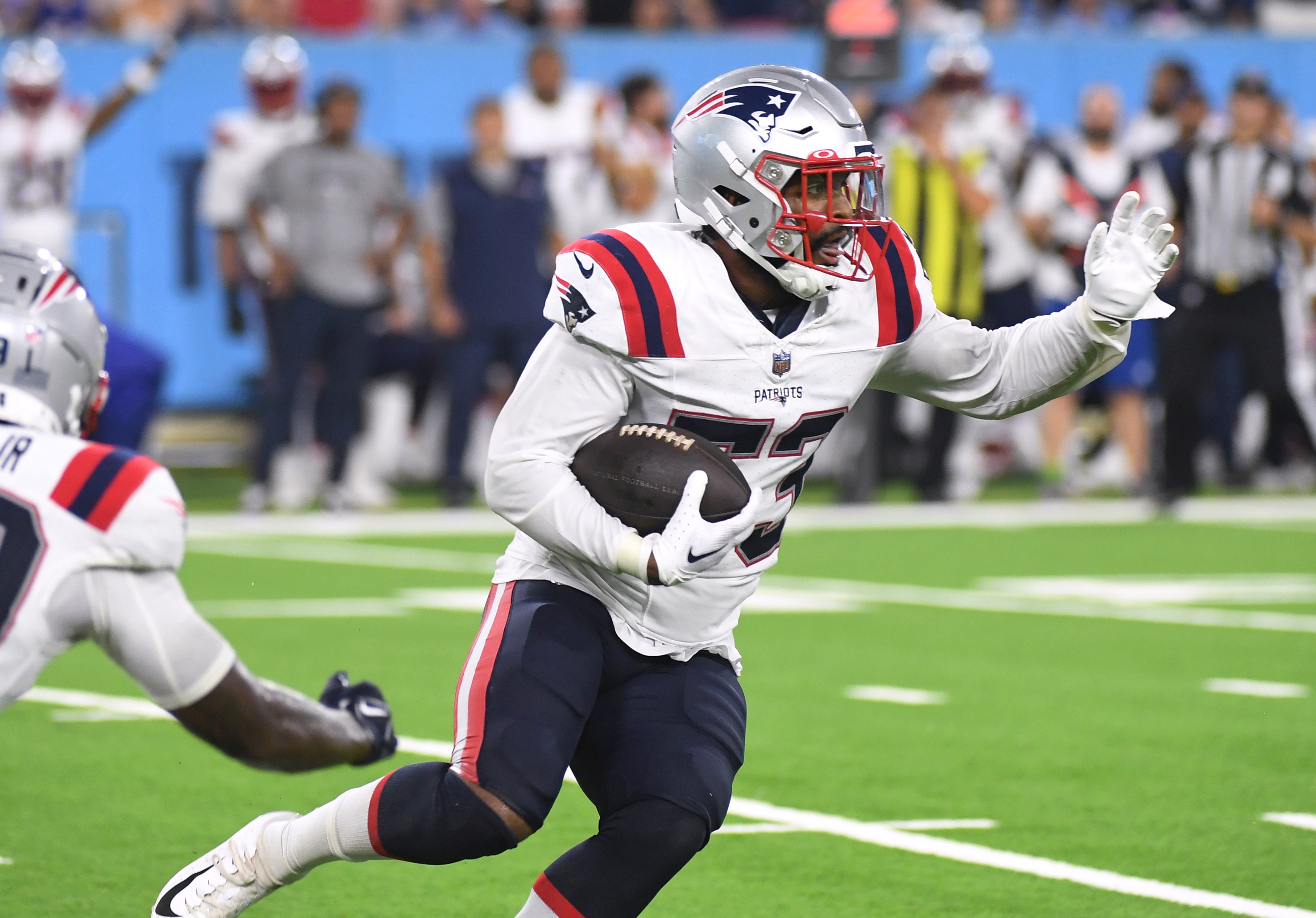 Aug 25, 2023; Nashville, Tennessee, USA; New England Patriots linebacker Joe Giles-Harris (53) runs with the ball after an interception during the second half against the Tennessee Titans at Nissan Stadium.