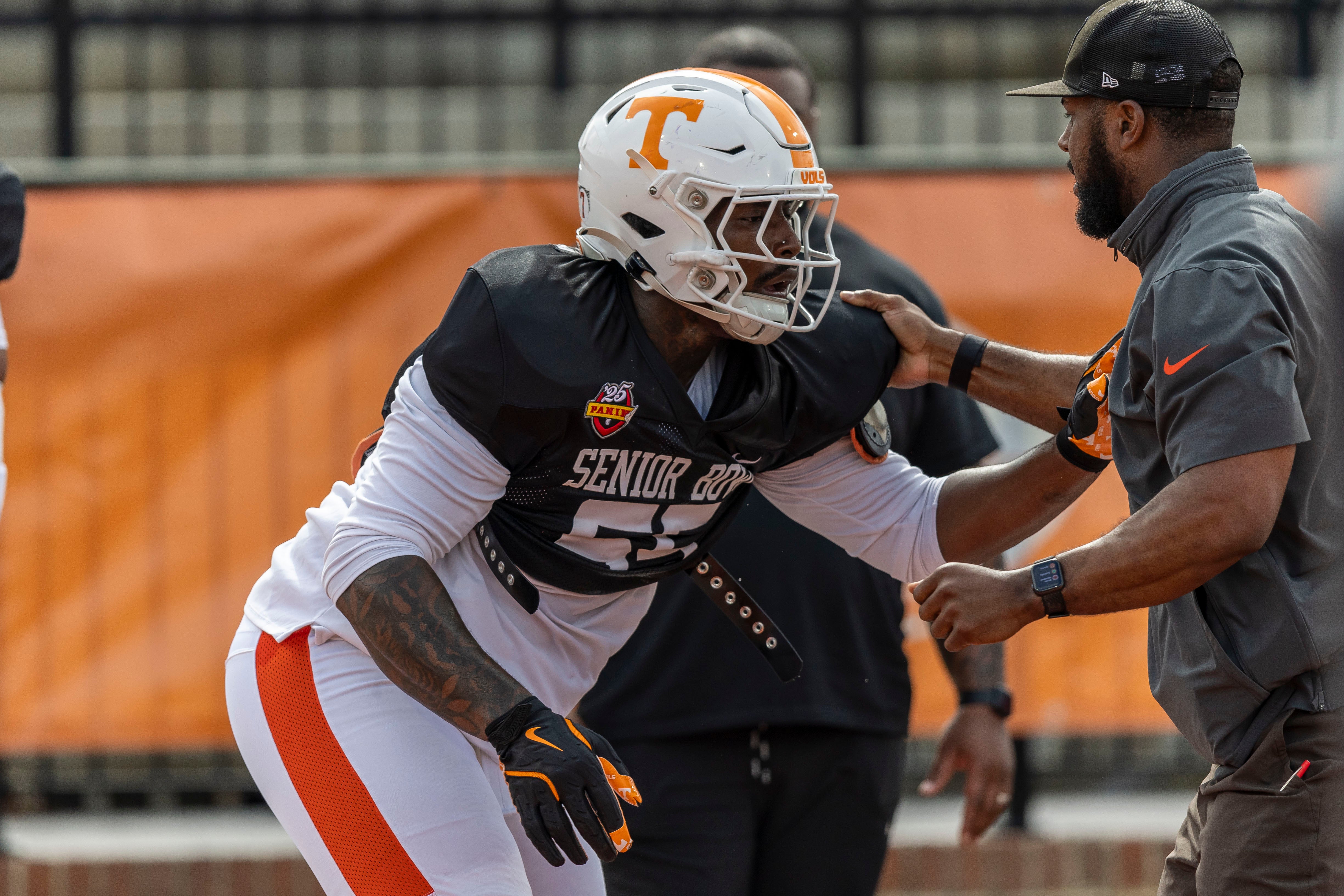 Jan 30, 2025; Mobile, AL, USA; American team defensive lineman Omarr Norman-Lott of Tennessee (55) works through drills during Senior Bowl practice for the American team at Hancock Whitney Stadium.