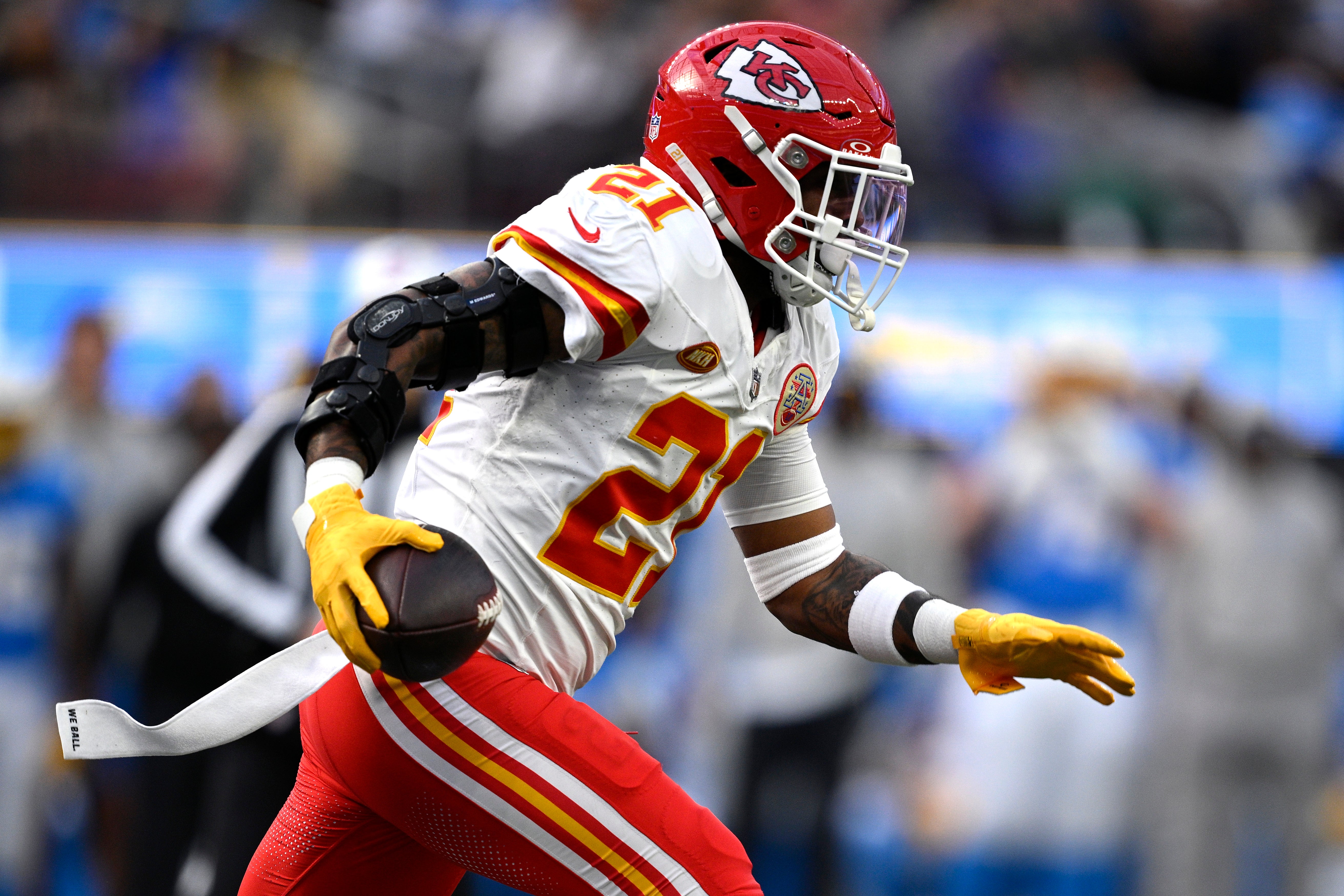 Jan 7, 2024; Inglewood, California, USA; Kansas City Chiefs safety Mike Edwards (21) returns a fumble for a touchdown during the first half against the Los Angeles Chargers at SoFi Stadium.