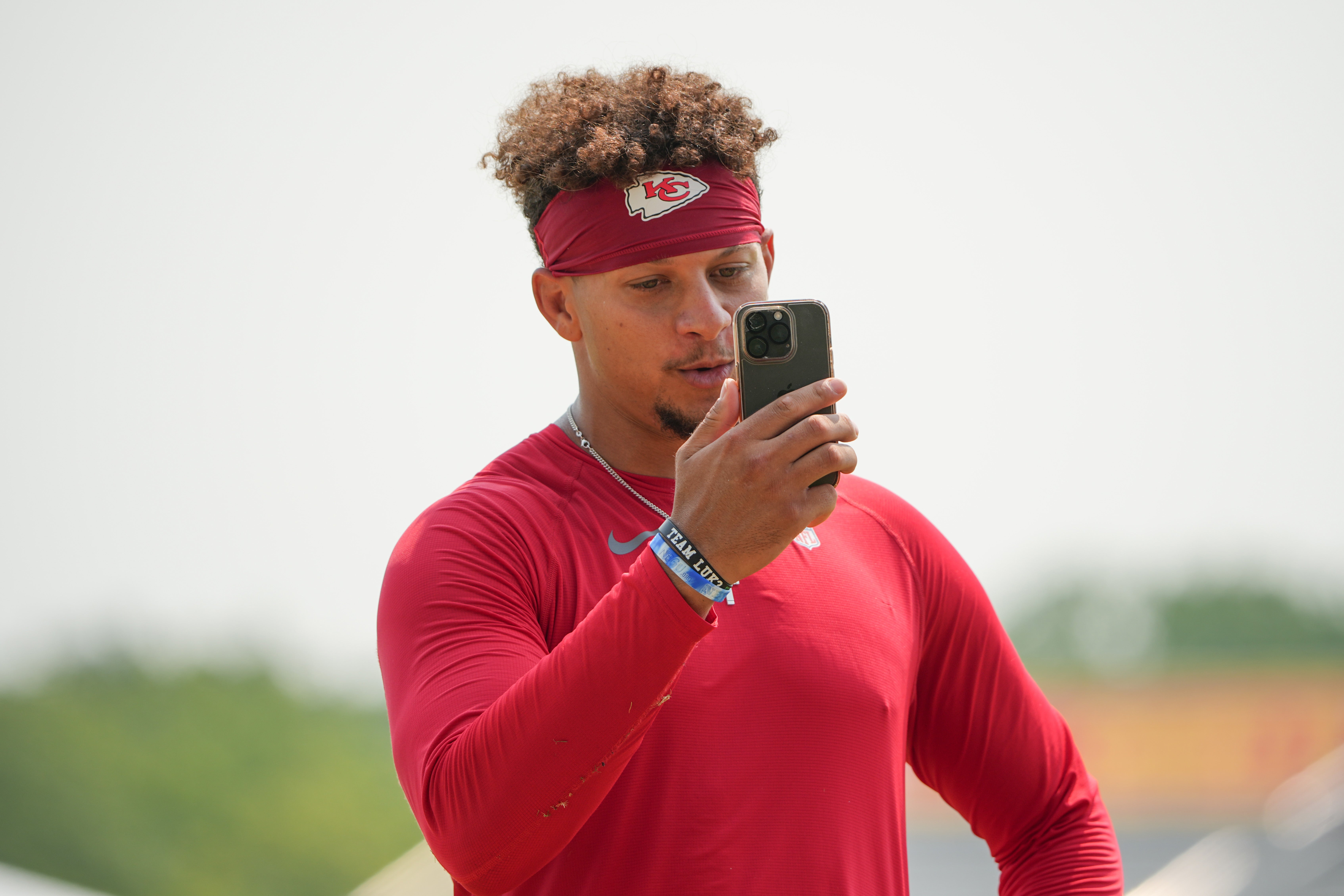 Jul 26, 2024; Kansas City, MO, USA; Kansas City Chiefs quarterback Patrick Mahomes (15) records a video message after training camp at Missouri Western State University.