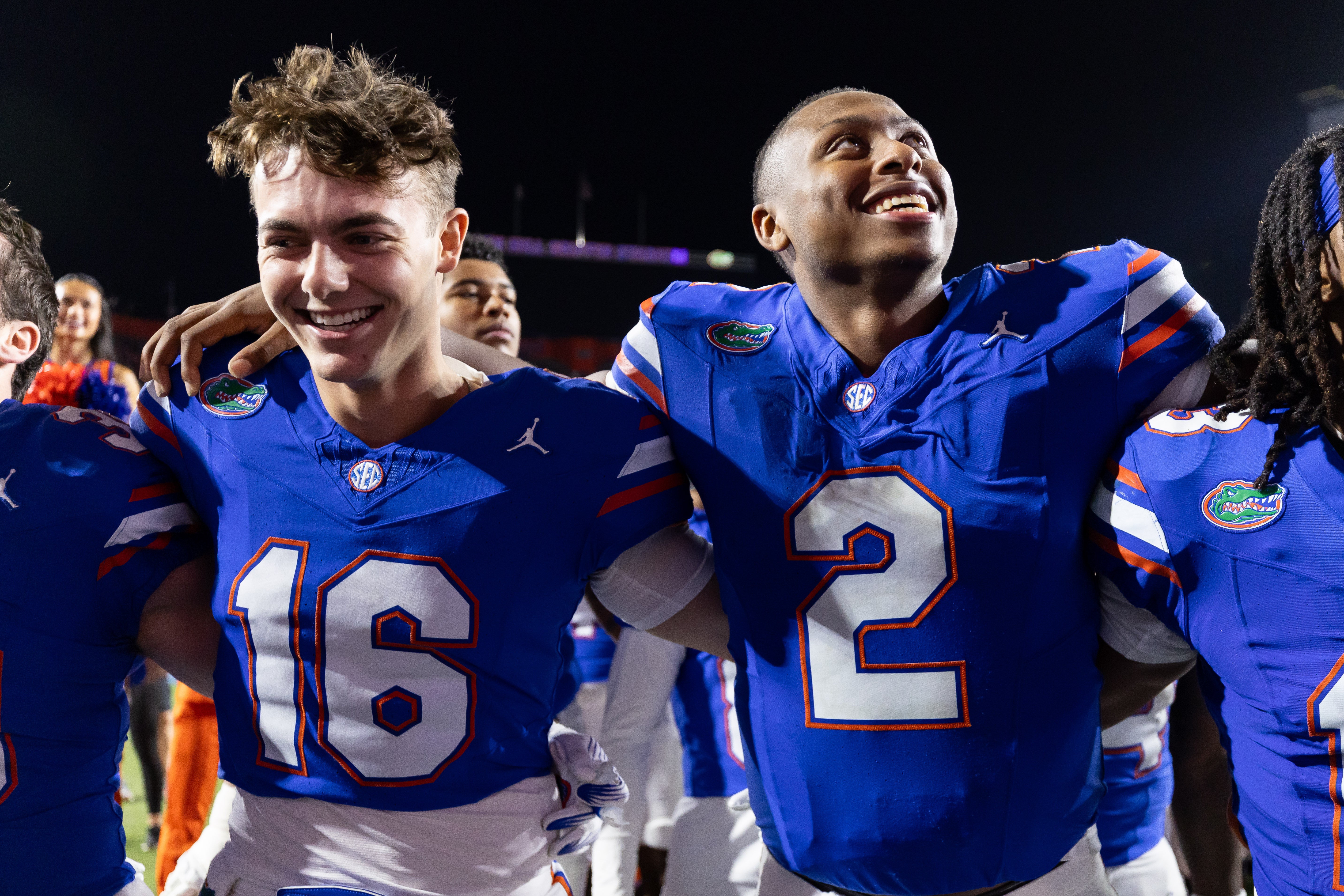 Oct 19, 2024; Gainesville, Florida, USA; Florida Gators quarterback Aidan Warner (16) and Florida Gators quarterback DJ Lagway (2) smile after a game against the Kentucky Wildcats at Ben Hill Griffin Stadium.