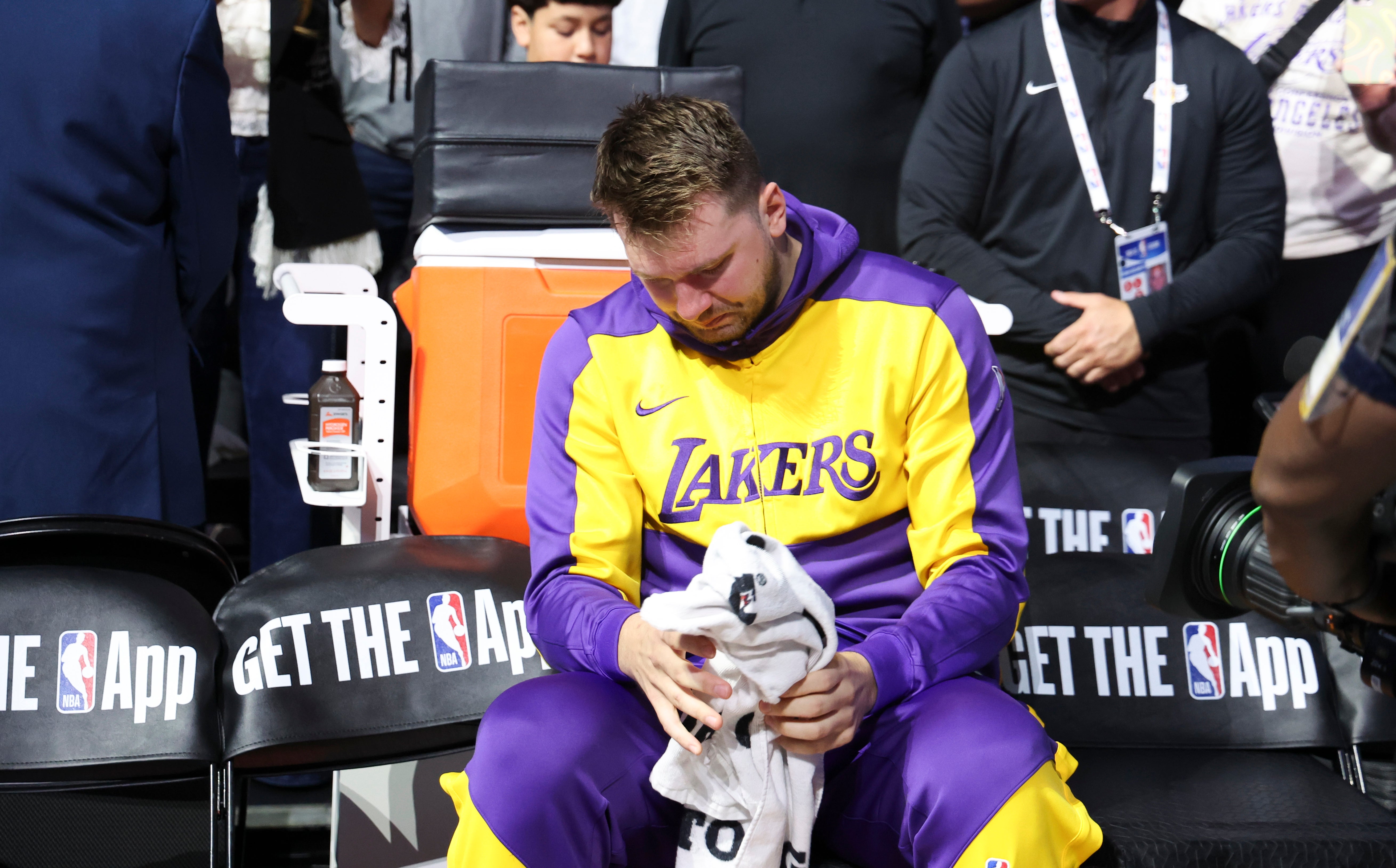 Los Angeles Lakers guard Luka Doncic (77) reacts while watching a tribute video before the game against the Dallas Mavericks at American Airlines Center.
