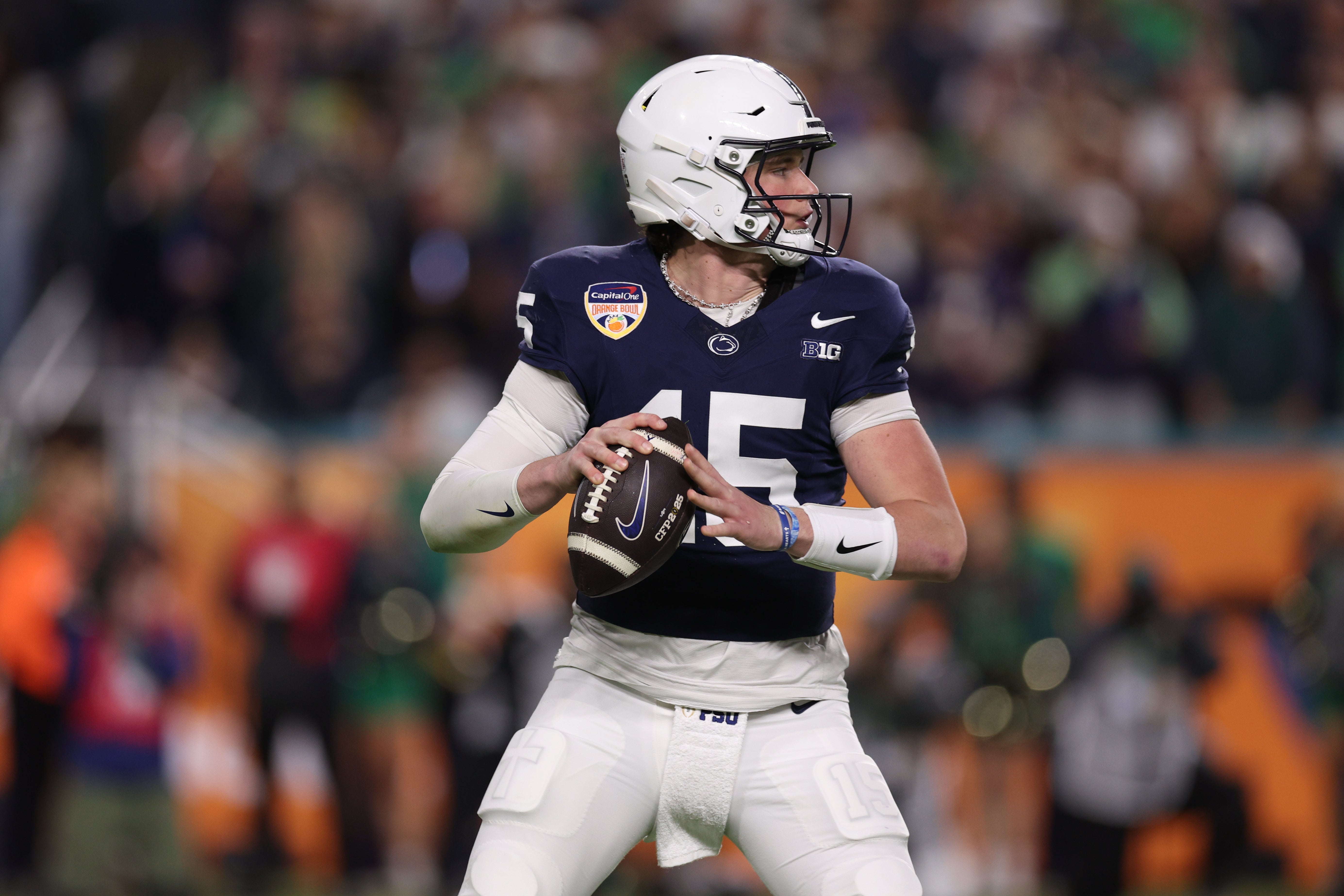 Jan 9, 2025; Miami, FL, USA; Penn State Nittany Lions quarterback Drew Allar (15) looks to pass in the second half against the Notre Dame Fighting Irish in the Orange Bowl at Hard Rock Stadium. Mandatory Credit: Nathan Ray Seebeck-Imagn Images