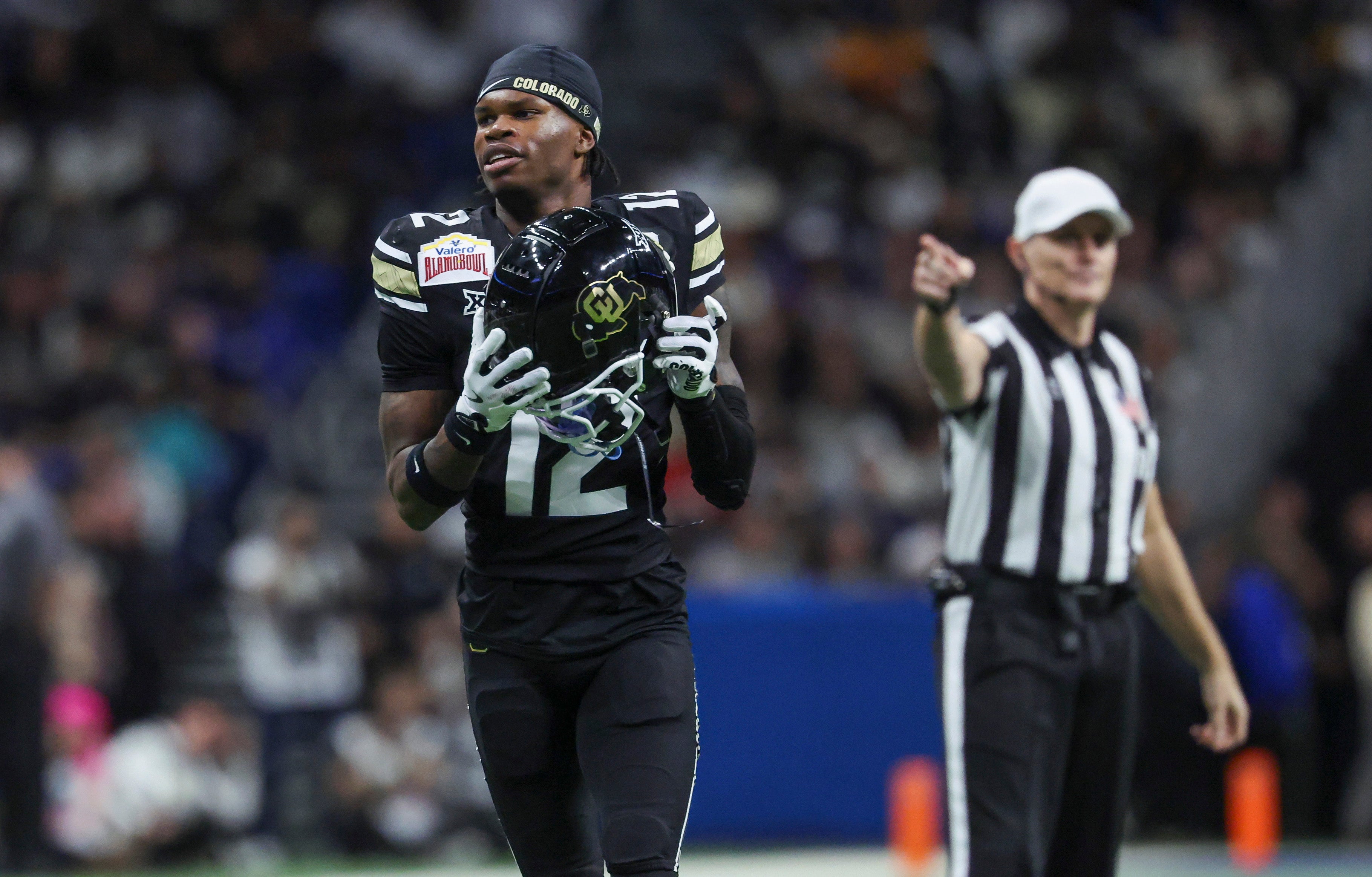 Dec 28, 2024; San Antonio, TX, USA; Colorado Buffaloes wide receiver Travis Hunter (12) reacts after a penalty is called during the second quarter against the Brigham Young Cougars at Alamodome.