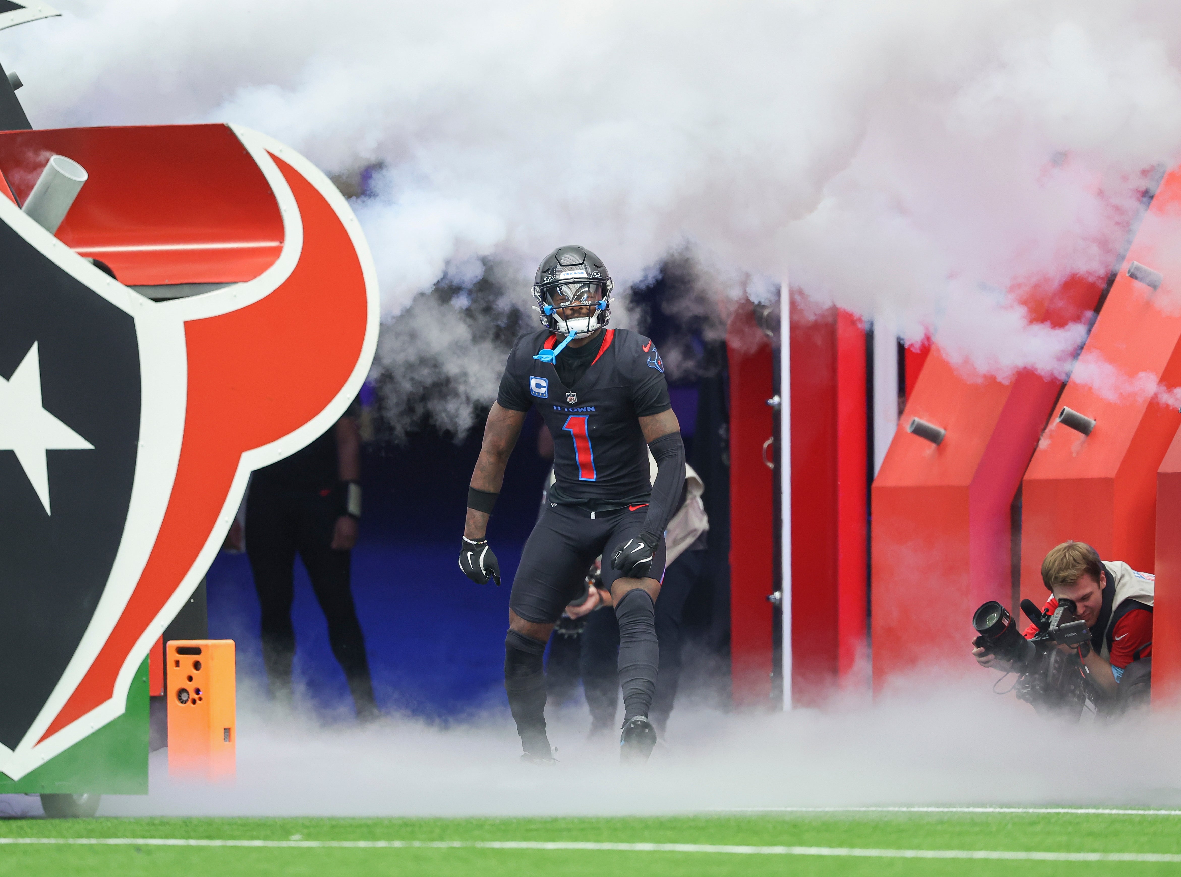 Oct 6, 2024; Houston, Texas, USA; Houston Texans wide receiver Stefon Diggs (1) is introduced before the game against the Buffalo Bills at NRG Stadium.