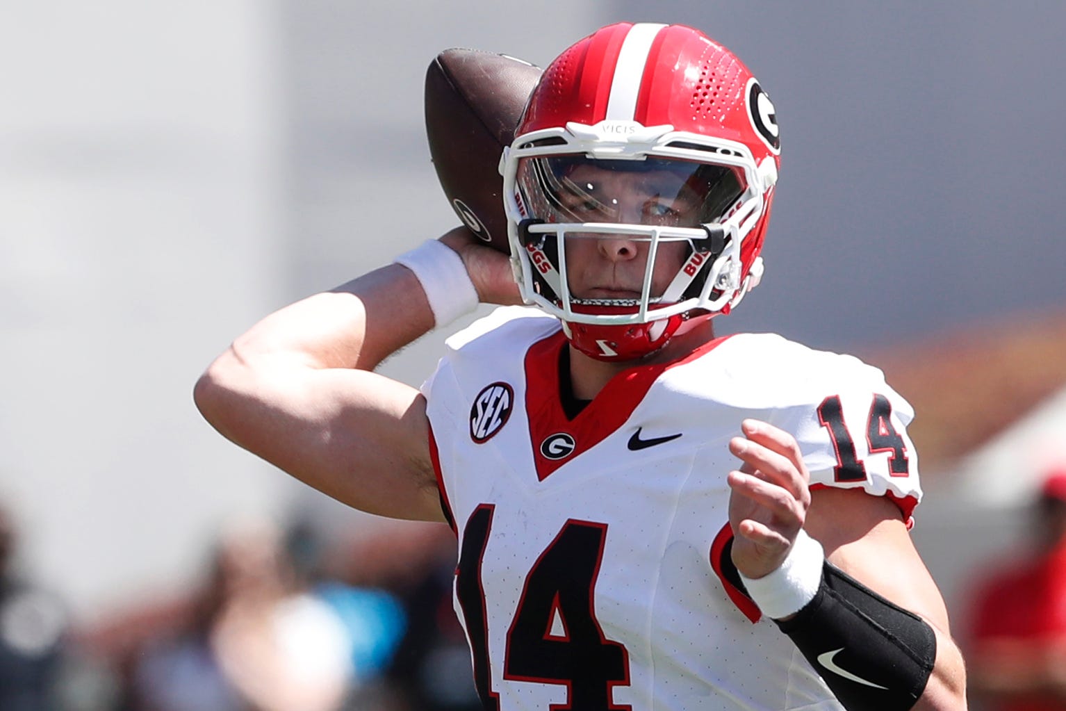 Georgia quarterback Gunner Stockton (14) throws a pass during the G-Day spring football game in Athens, Ga..