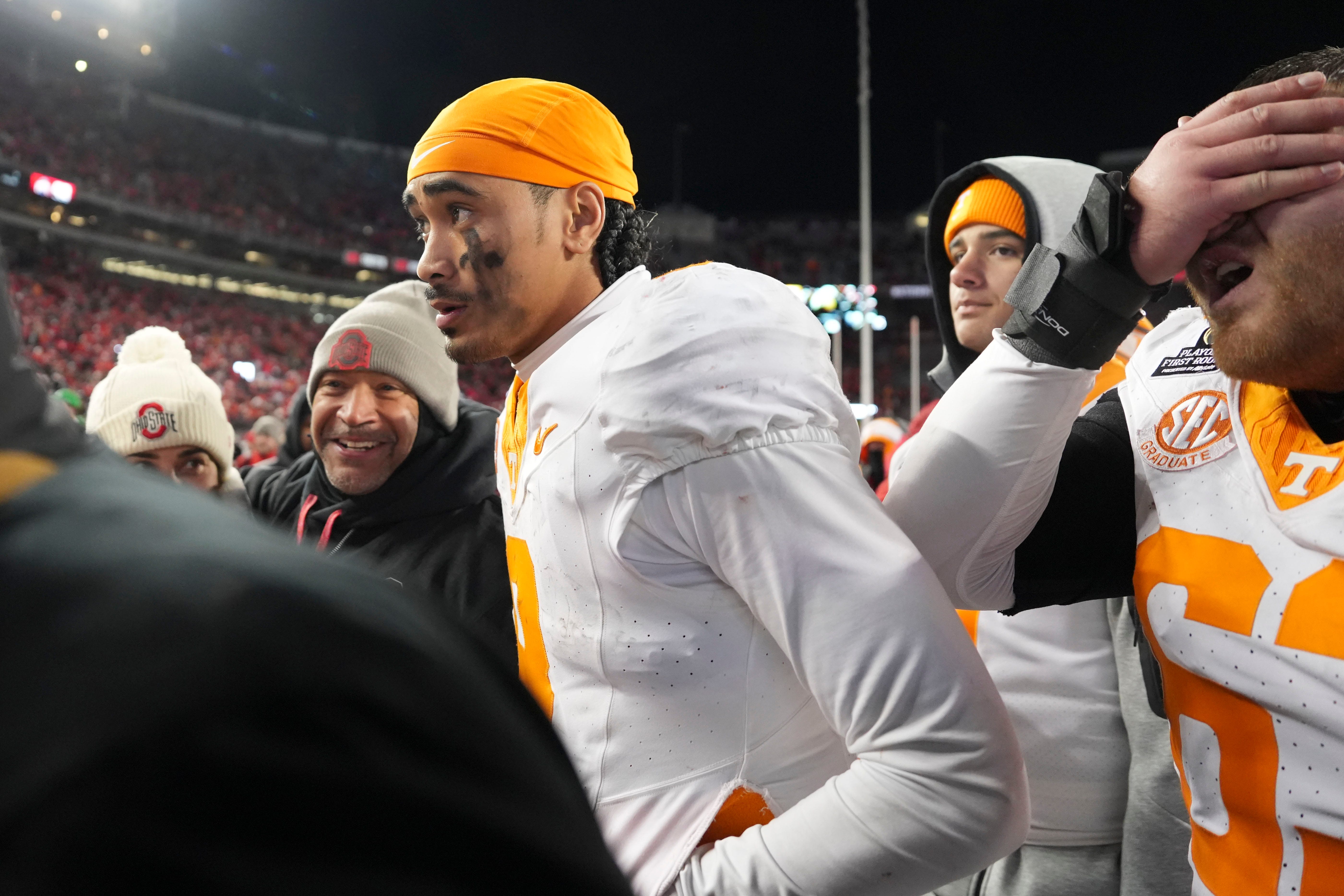 Tennessee quarterback Nico Iamaleava (8) walks off the field after the loss to Ohio State in the NCAA college football playoff game on Saturday, Dec. 21, 2024, in Columbus, Ohio.