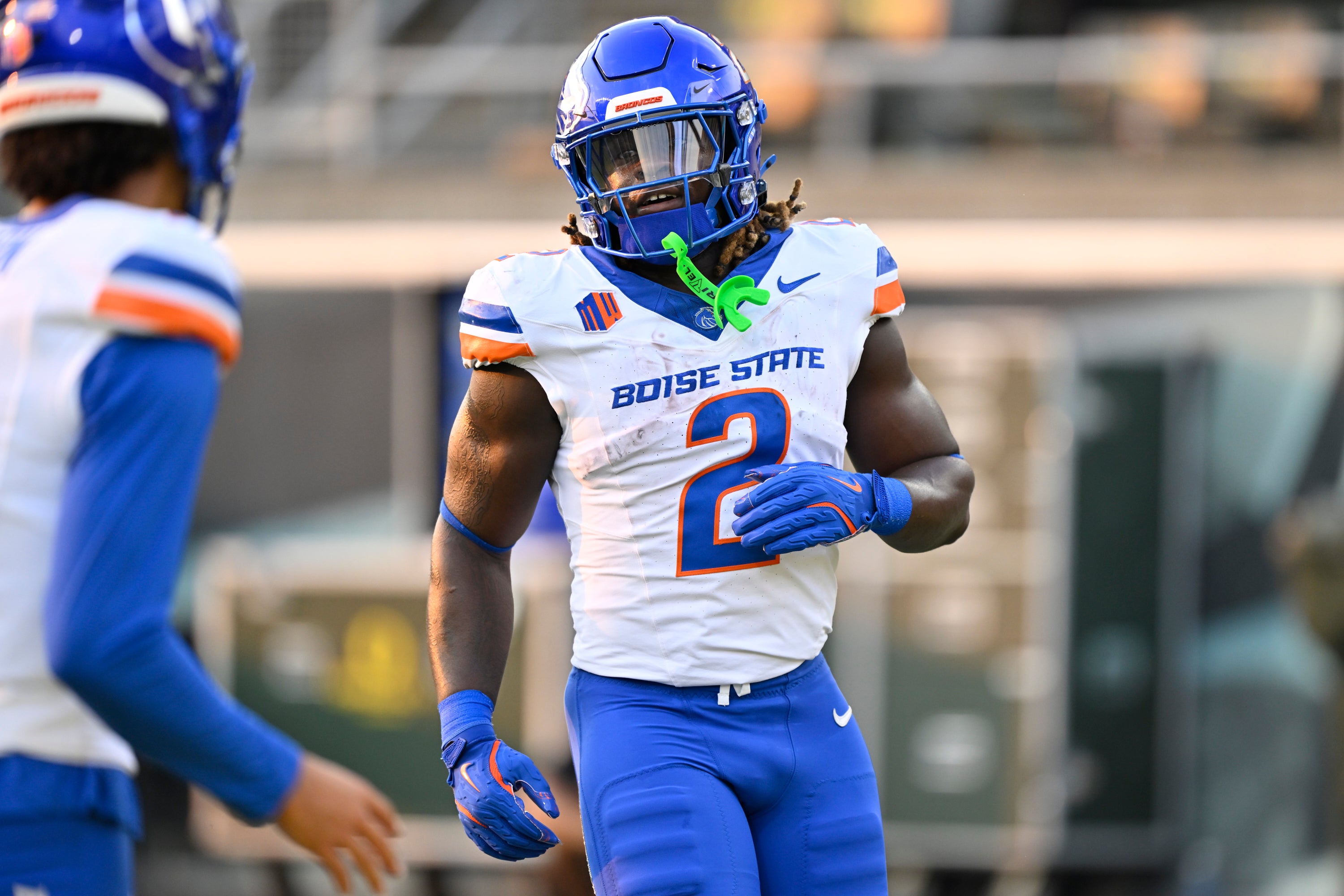 Sep 7, 2024; Eugene, Oregon, USA; Boise State Broncos running back Ashton Jeanty (2) warms up before a game against the Oregon Ducks at Autzen Stadium.