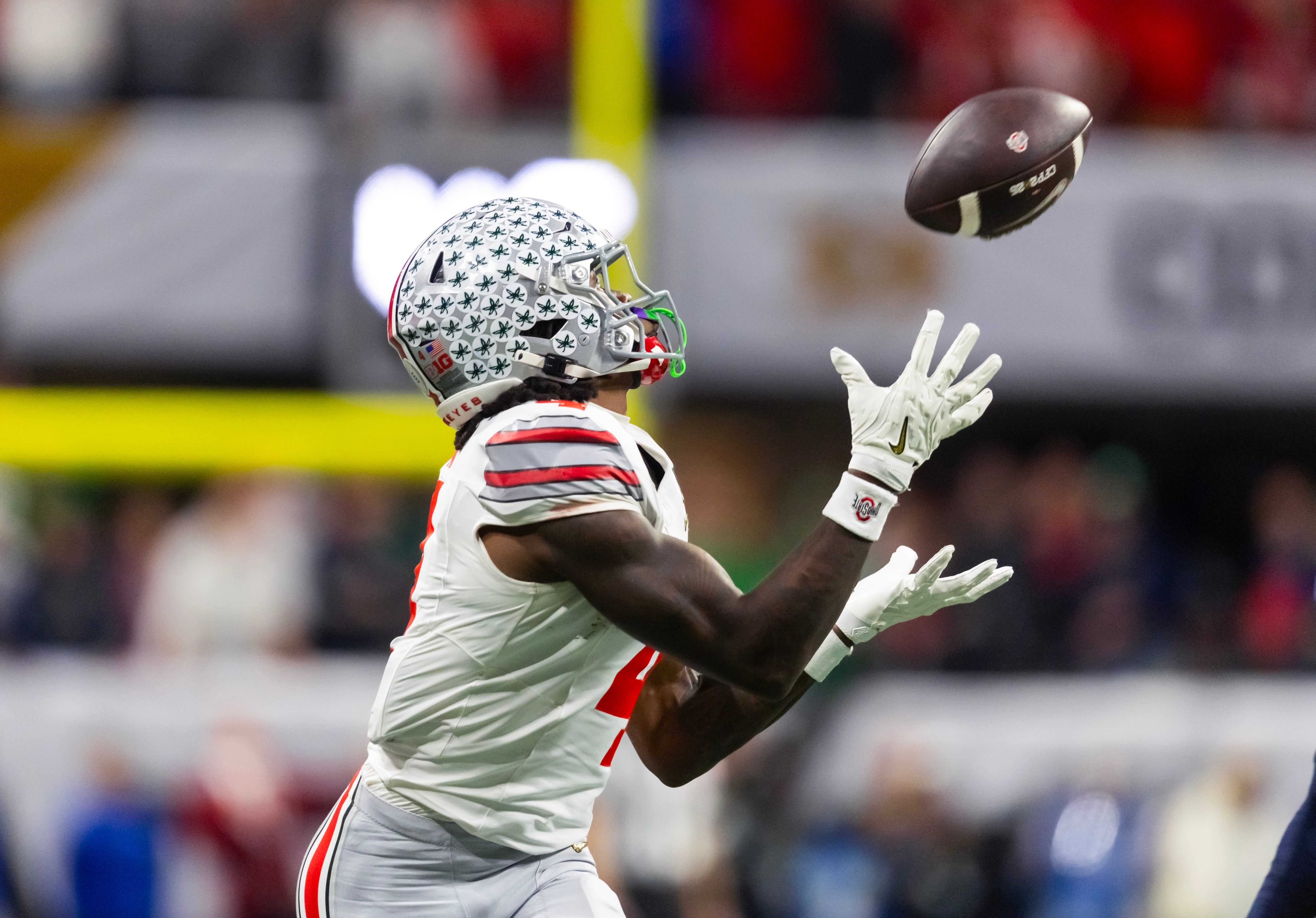 Jeremiah Smith hauls in a pass in the national championship game for the Ohio State Buckeyes