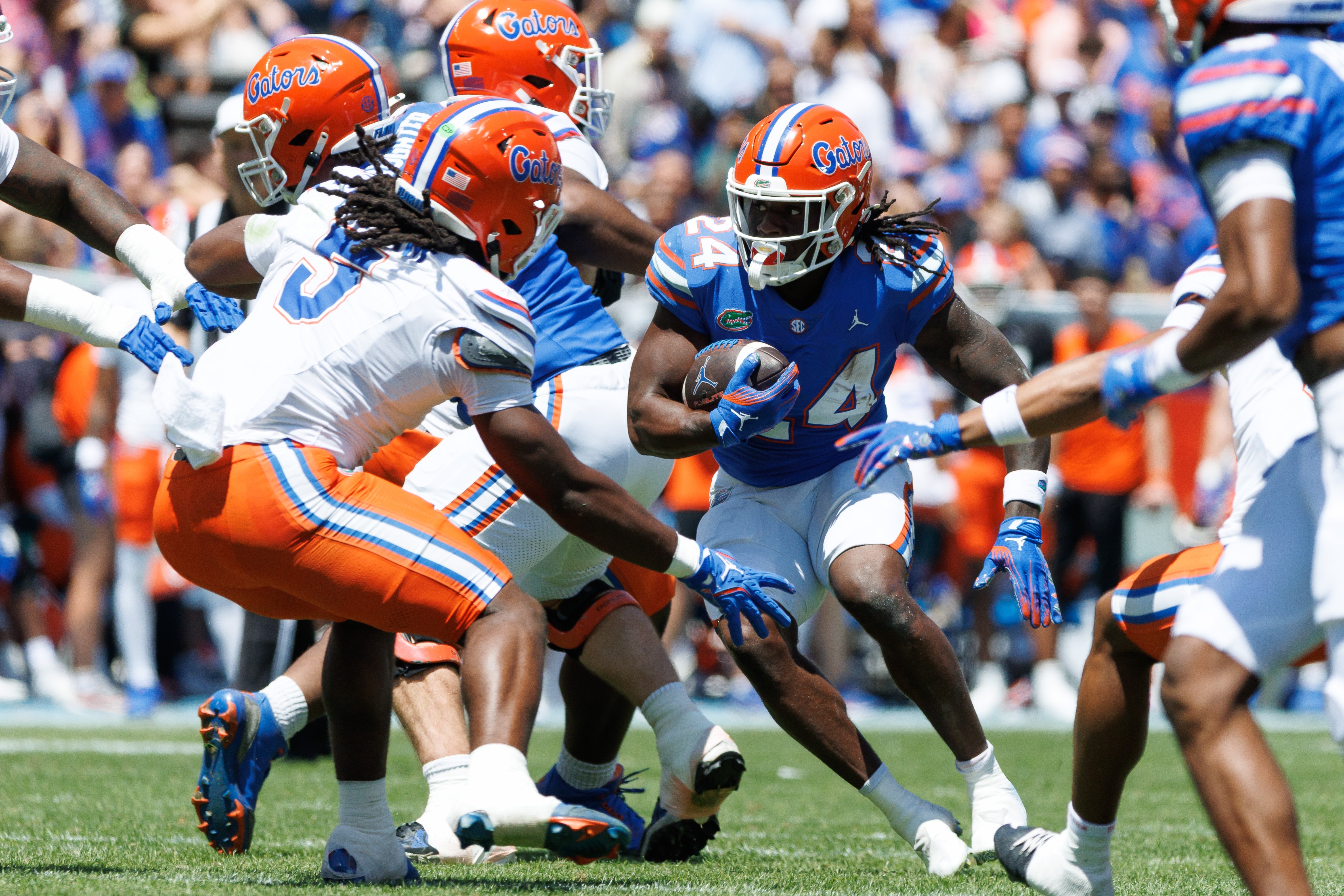 Apr 12, 2025; Gainesville, FL, USA; Florida Gators running back Ja'Kobi Jackson (24) runs with the ball during the first half at Ben Hill Griffin Stadium.