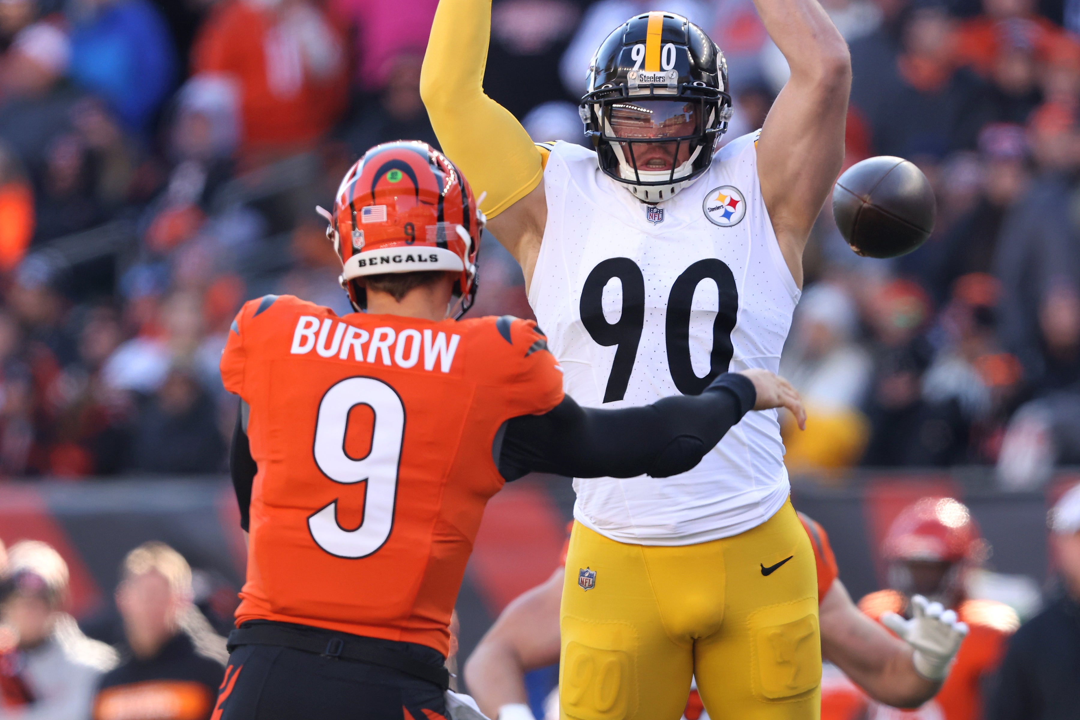 Dec 1, 2024; Cincinnati, Ohio, USA; Pittsburgh Steelers linebacker T.J. Watt (90) attempts to block the pass from Cincinnati Bengals quarterback Joe Burrow (9) during the first quarter at Paycor Stadium.