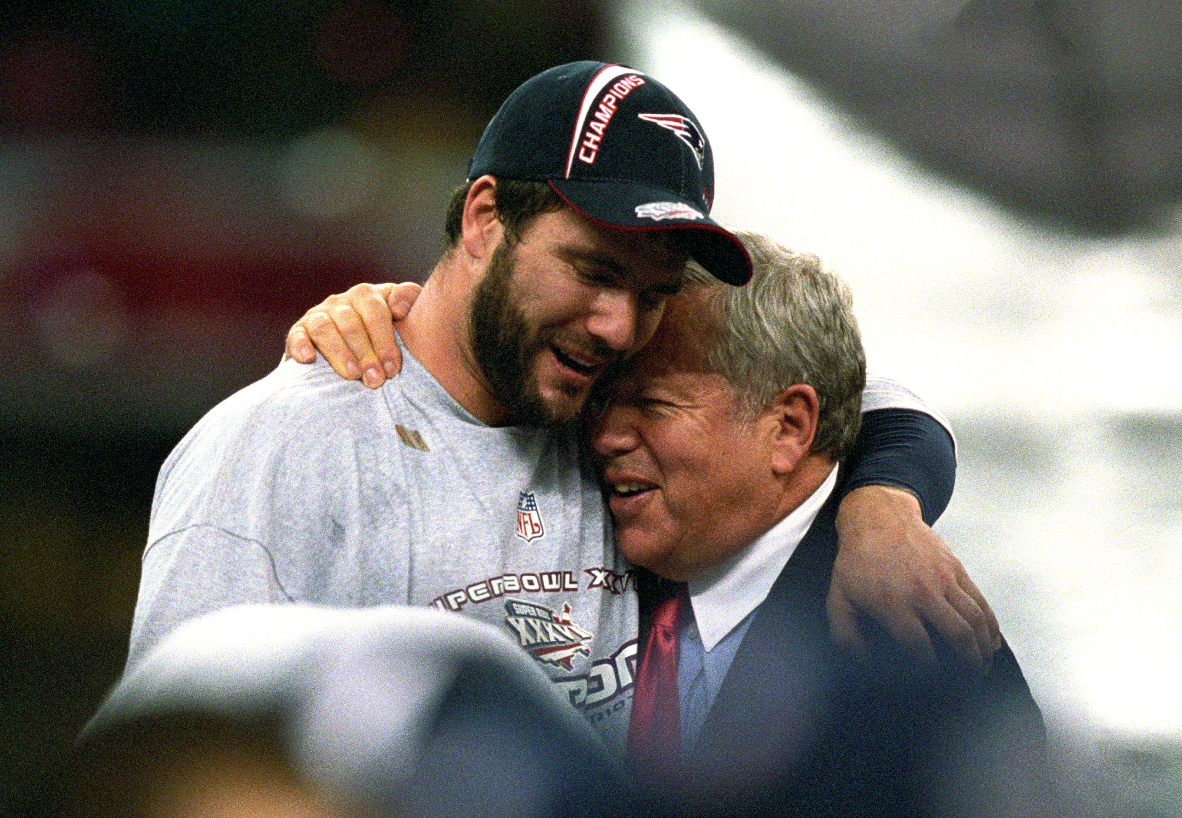 Feb 3, 2002; New Orleans, LA, USA; New England Patriots kicker Adam Vinatieri (4) celebrates winning Super Bowl XXXVI with Patriots owner Robert Kraft over the St. Louis Rams at the Louisiana Superdome. The Patriots defeated the Rams 20-17.