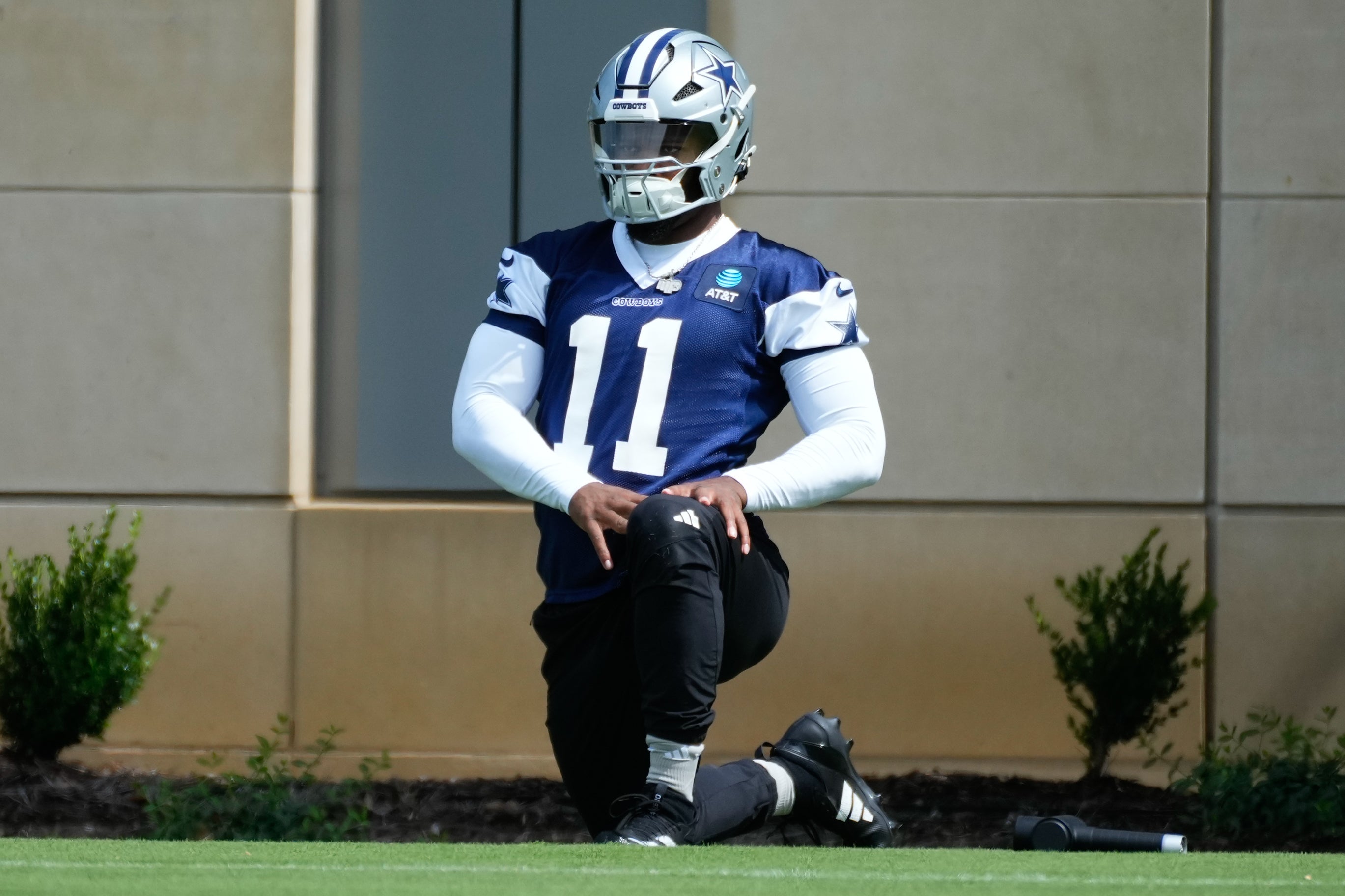 Dallas Cowboys linebacker Micah Parson (11) warms up during practice at the Ford Center at the Star Training Facility in Frisco, Texas.