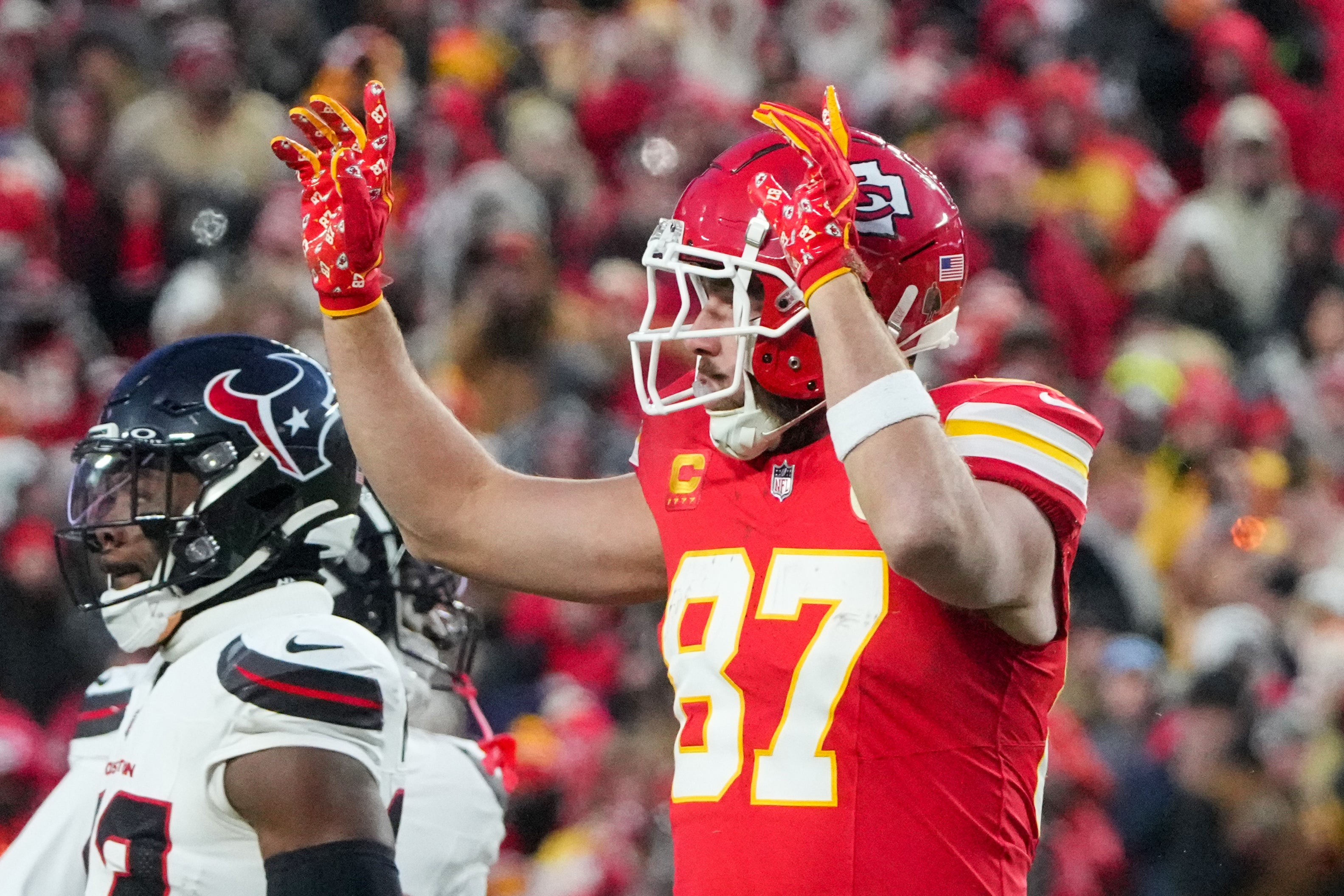 Jan 18, 2025; Kansas City, Missouri, USA; Kansas City Chiefs tight end Travis Kelce (87) celebrates after a play against the Houston Texans during the second half of a 2025 AFC divisional round game at GEHA Field at Arrowhead Stadium.