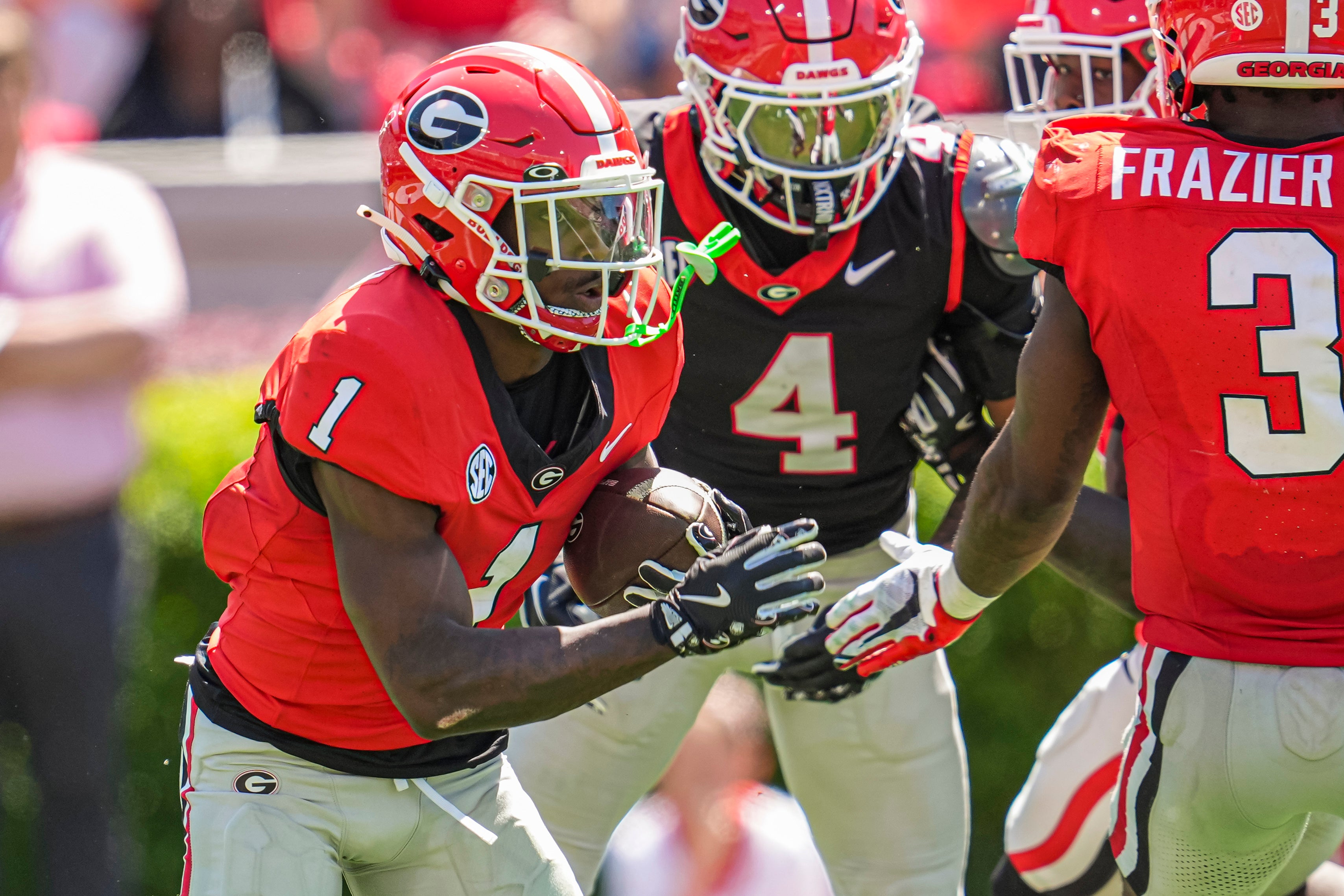 Georgia Bulldogs wide receiver Zachariah Branch (1) runs with the ball during the Georgia Spring game at Sanford Stadium.