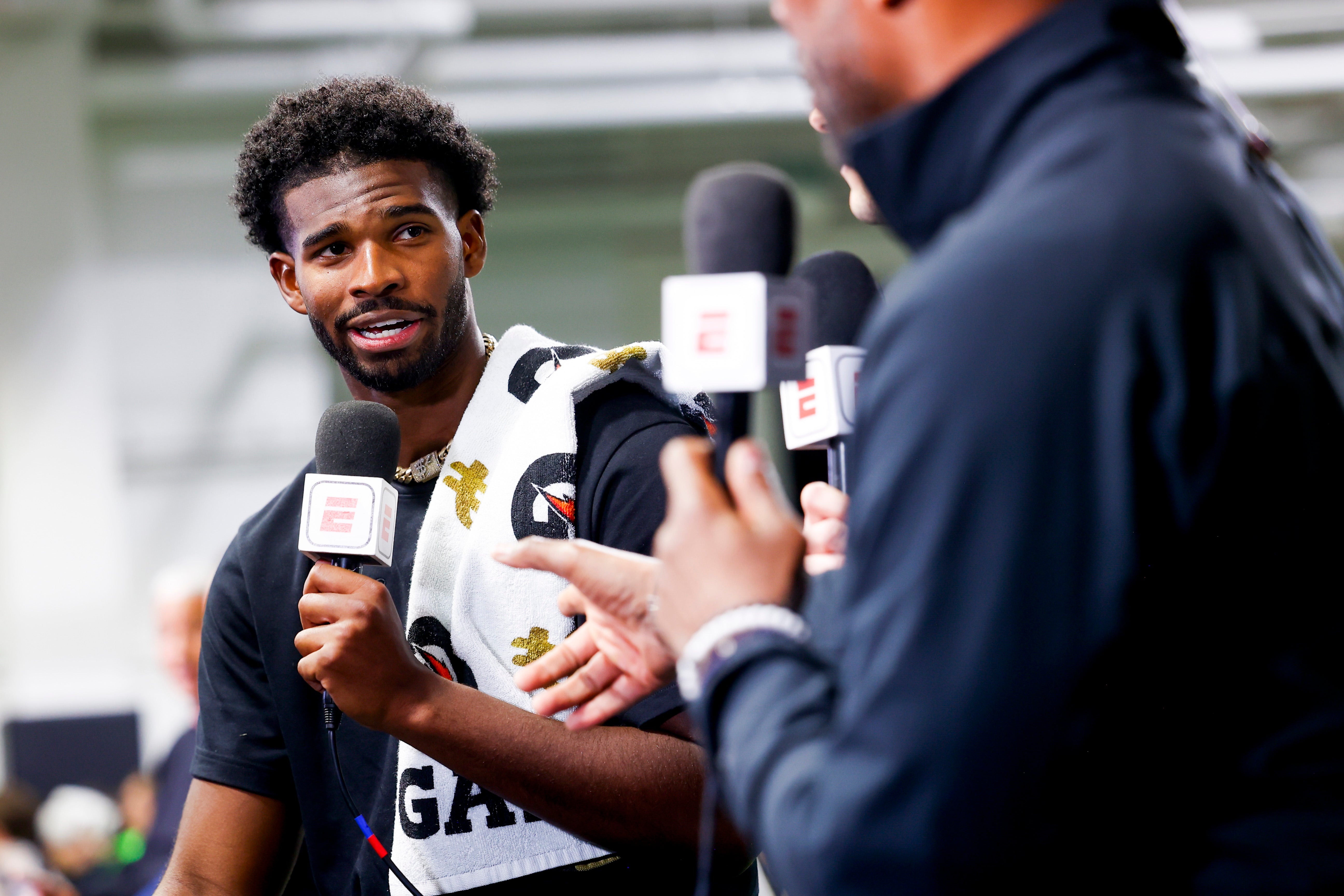 Colorado Buffaloes quarterback Shedeur Sanders (2) talks to ESPN after the University of Colorado NFL Showcase at the CU Indoor Practice Facility.
