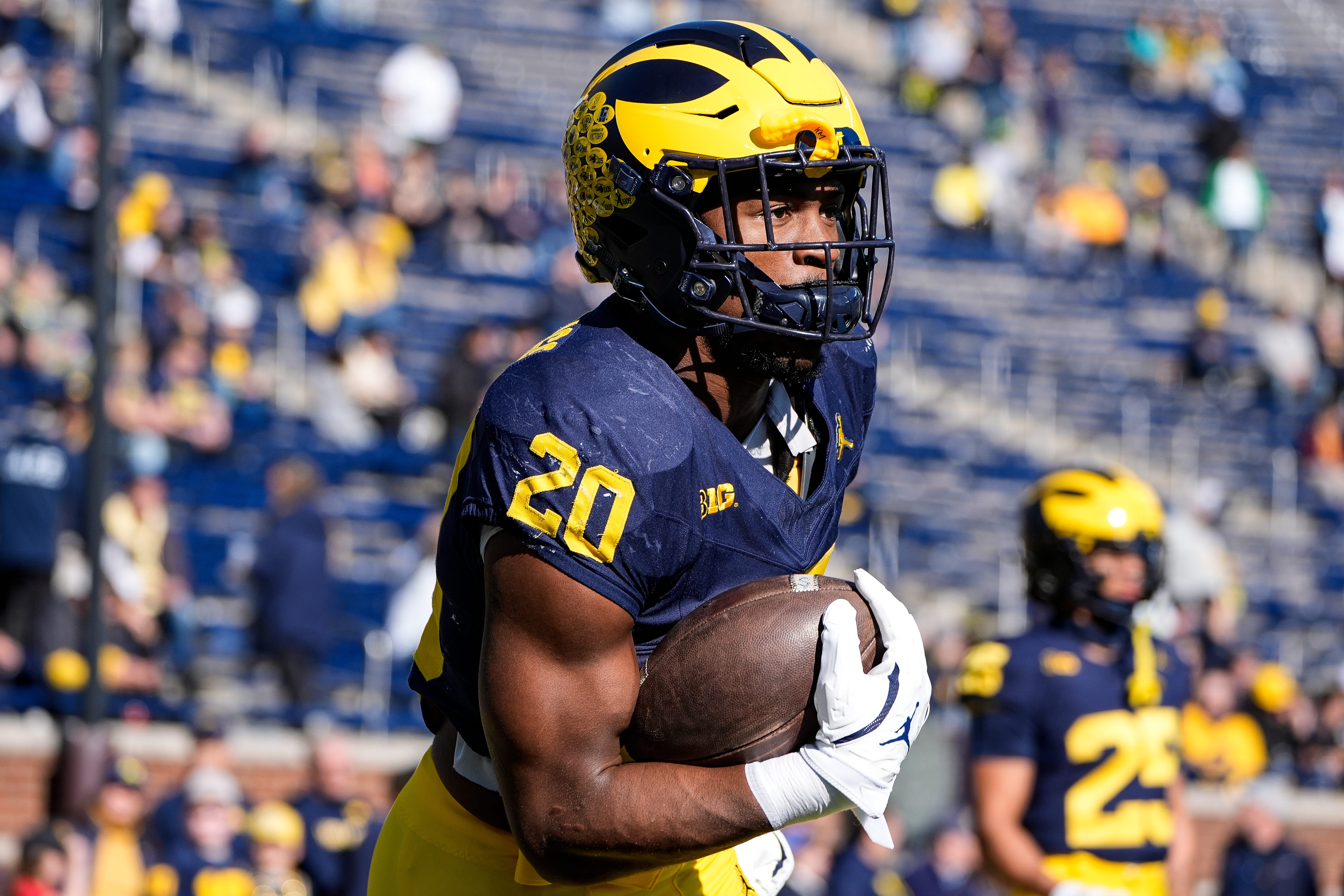 Michigan running back Kalel Mullings (20) warms up before the Oregon game at Michigan Stadium in Ann Arbor on Saturday, Nov. 2, 2024.