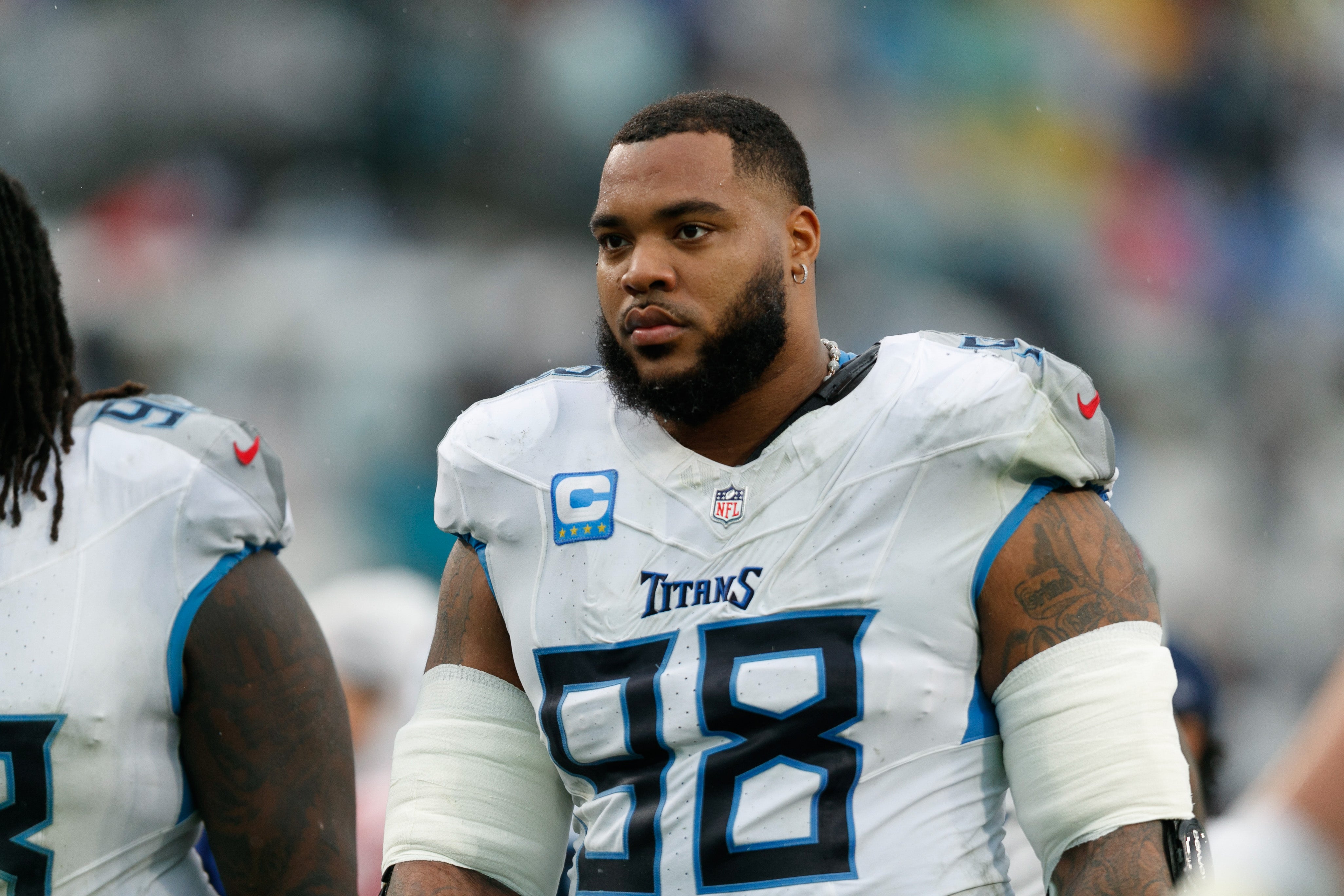 Tennessee Titans defensive tackle Jeffery Simmons (98) heads to the locker room for half time against the Jacksonville Jaguars at EverBank Stadium. Morgan Tencza-Imagn Images