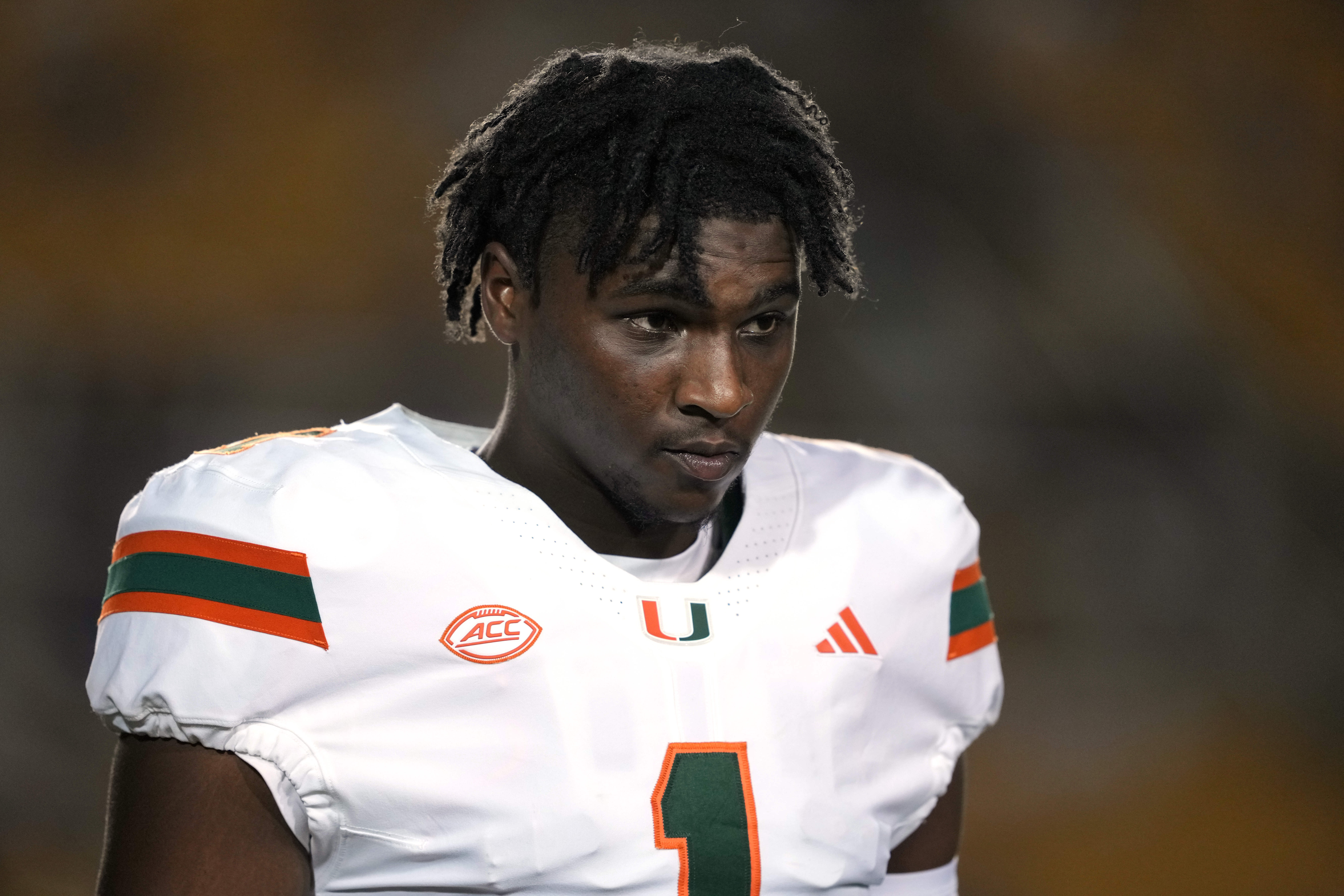 Miami Hurricanes quarterback Cam Ward (1) walks on the field before the game against the California Golden Bears at California Memorial Stadium. Darren Yamashita-Imagn Images