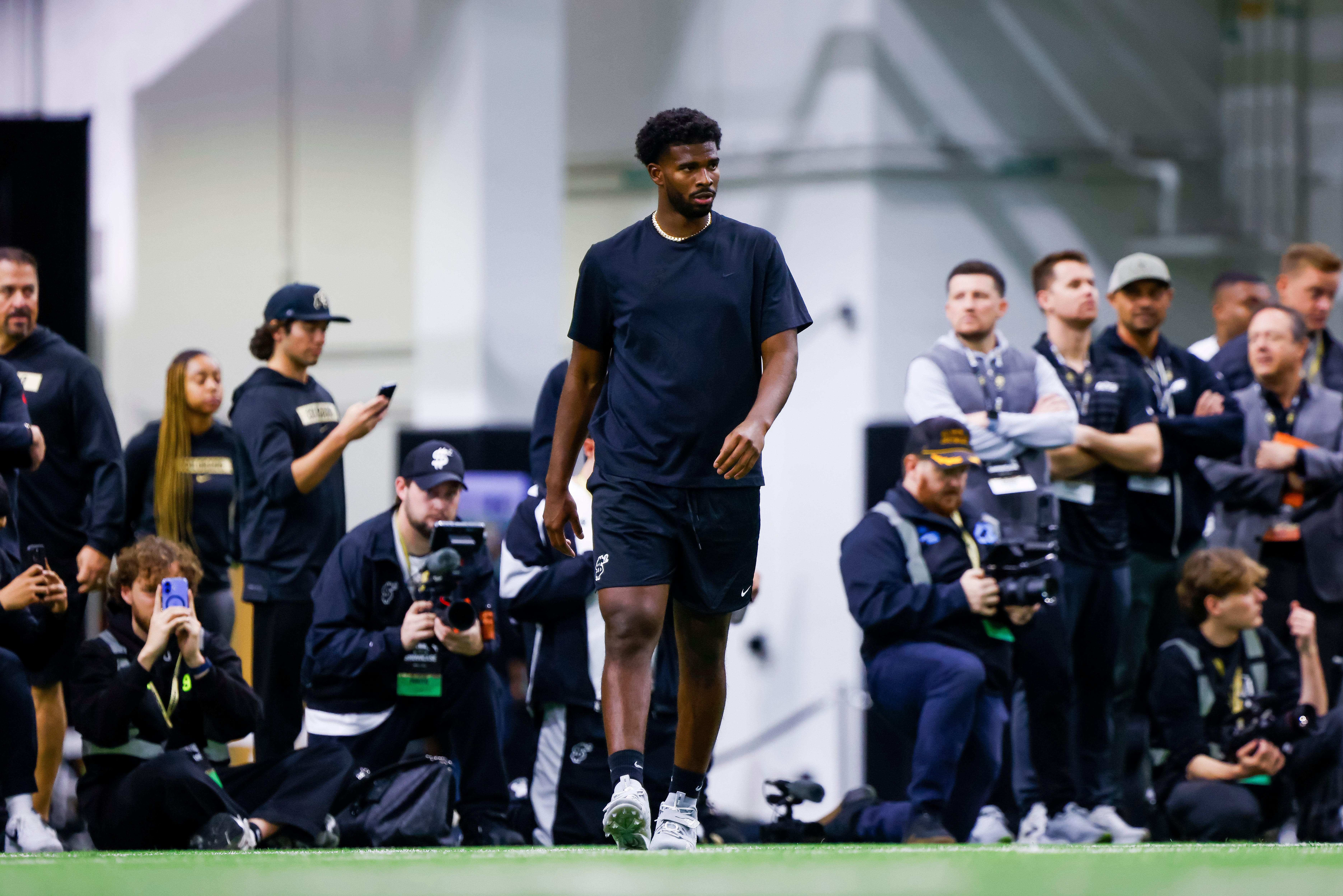 Colorado Buffaloes quarterback Shedeur Sanders (2) runs drills at the University of Colorado NFL Showcase at the CU Indoor Practice Facility.