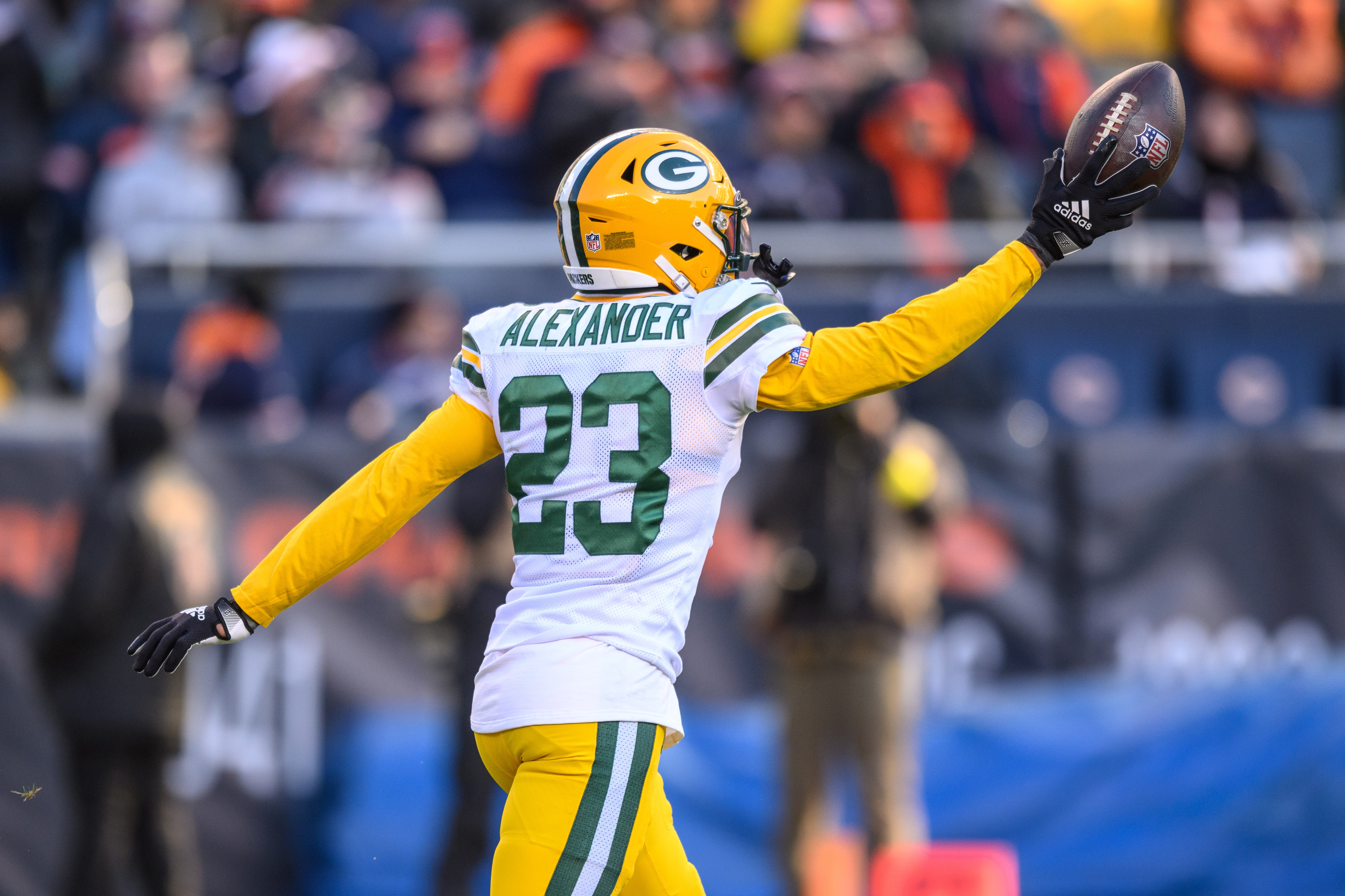 Green Bay Packers cornerback Jaire Alexander (23) celebrates his interception in the fourth quarter against the Chicago Bears at Soldier Field.