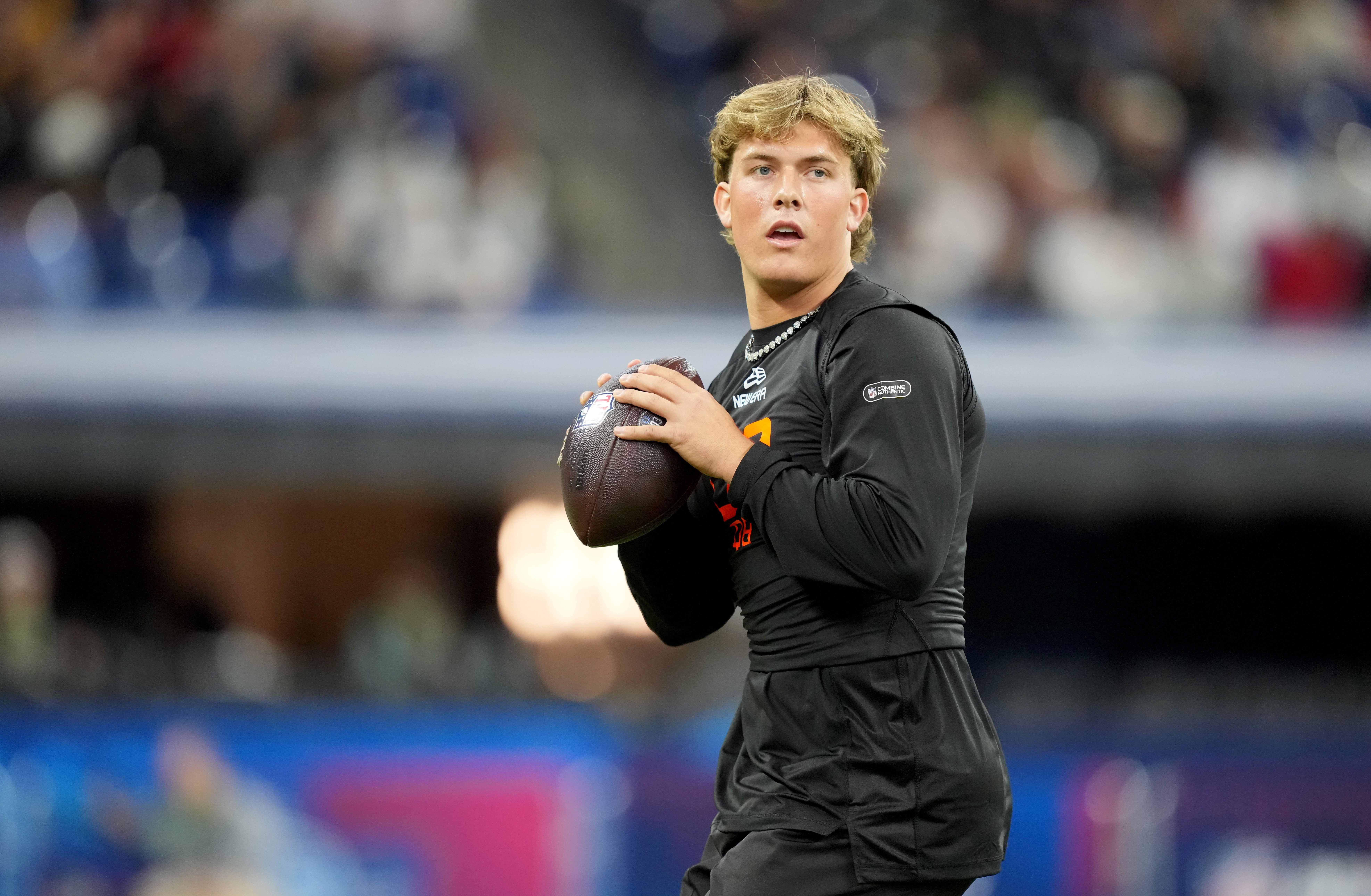 Mar 1, 2025; Indianapolis, IN, USA; Mississippi quarterback Jaxson Dart (QB03) during the 2025 NFL Combine at Lucas Oil Stadium. Mandatory Credit: Kirby Lee-Imagn Images