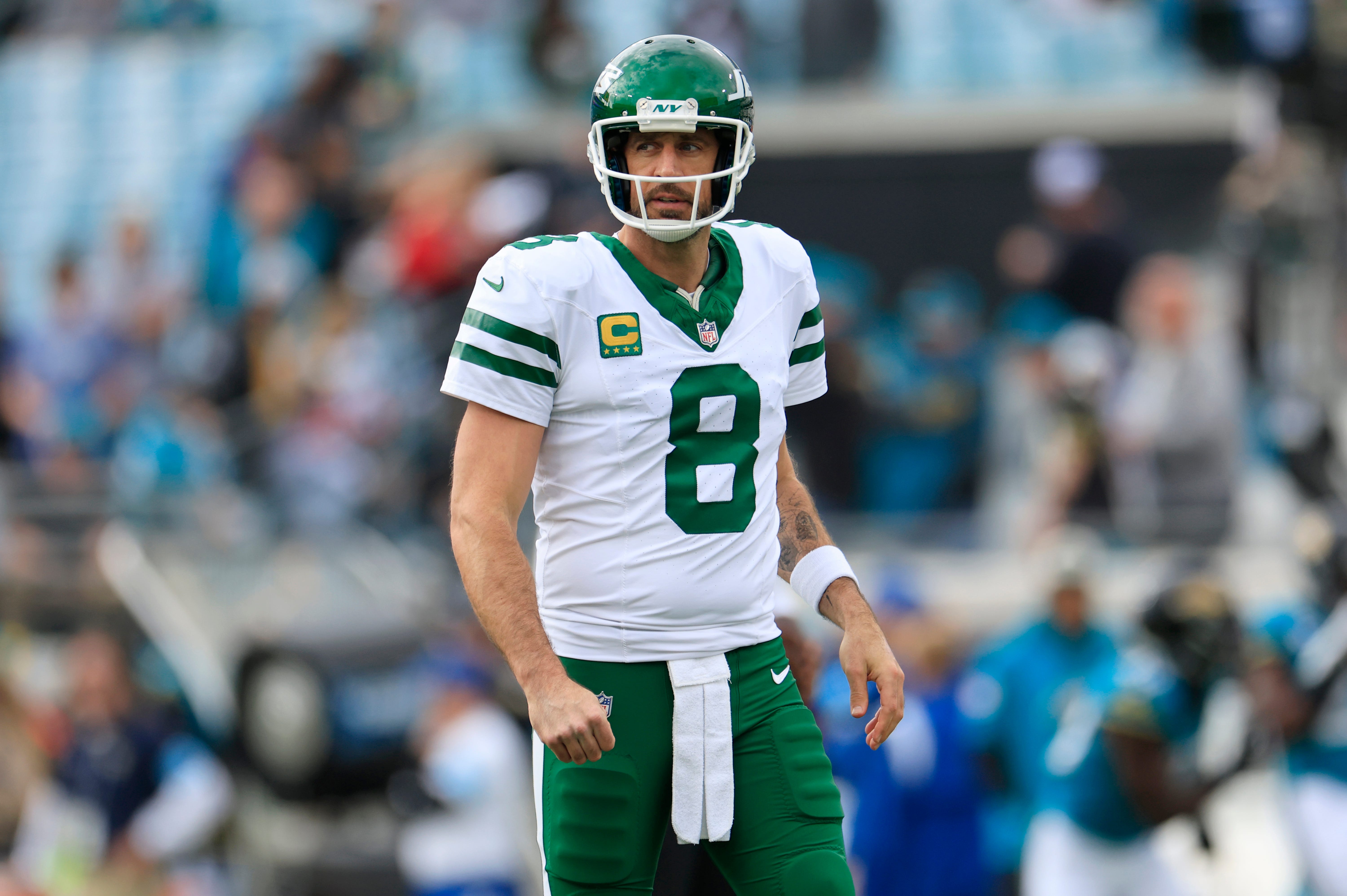 New York Jets quarterback Aaron Rodgers (8) looks on before an NFL football matchup Sunday, Dec. 15, 2024 at EverBank Stadium in Jacksonville, Fla. [Corey Perrine/Florida Times-Union]