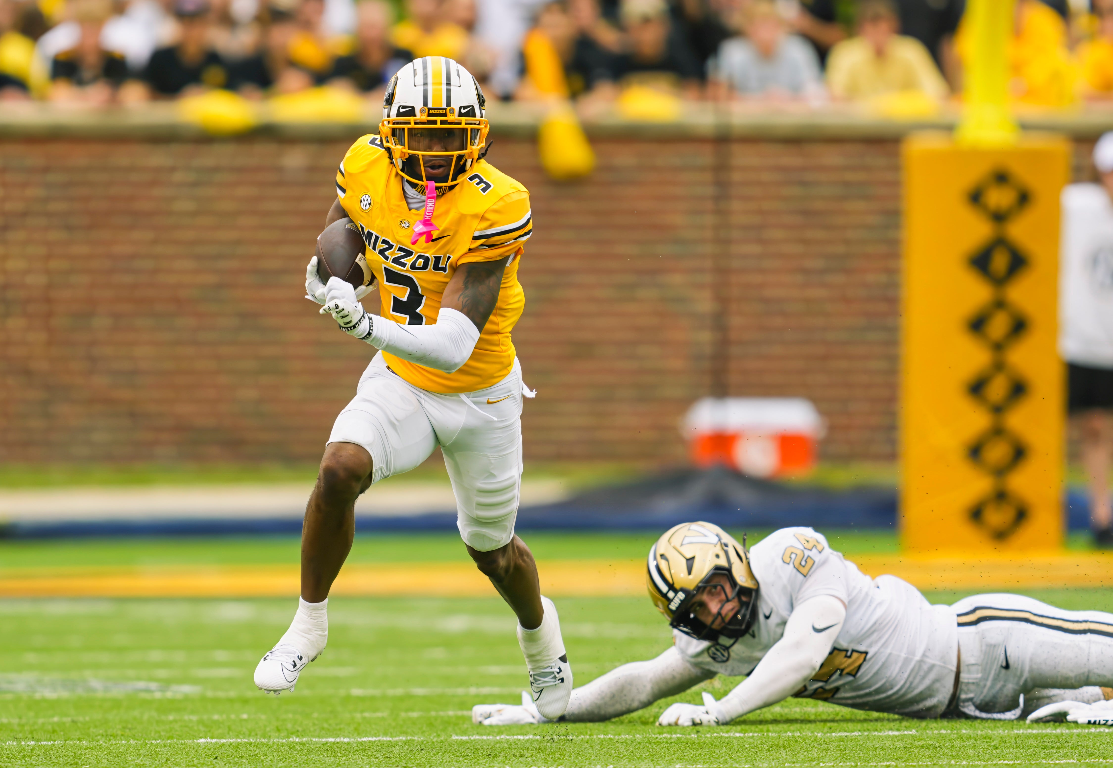 Sep 21, 2024; Columbia, Missouri, USA; Missouri Tigers wide receiver Luther Burden III (3) returns a punt against Vanderbilt Commodores linebacker Nicholas Rinaldi (24) during the first half at Faurot Field at Memorial Stadium.