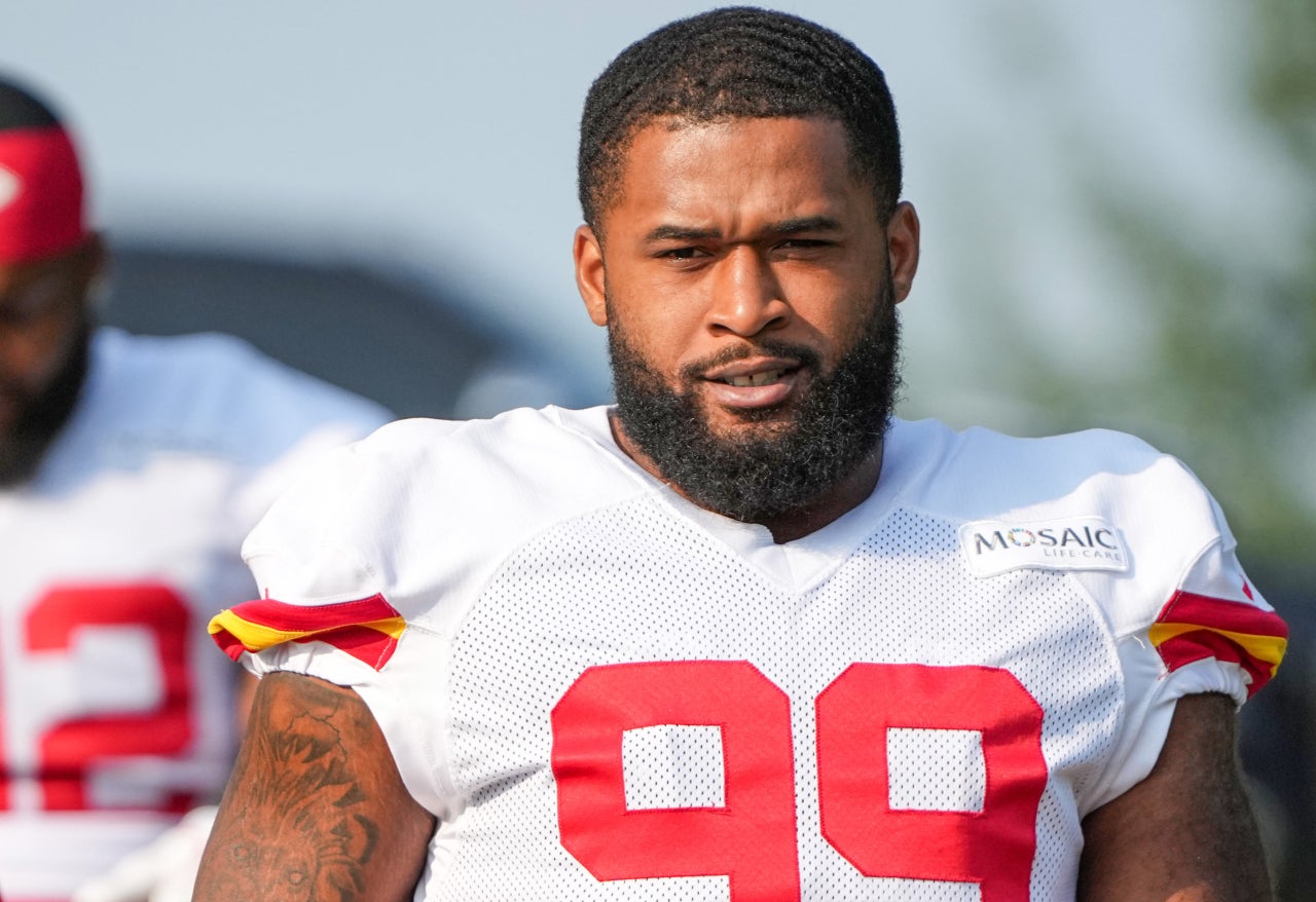 Jul 22, 2024; St. Joseph, MO, USA; Kansas City Chiefs defensive tackle Fabien Lovett Sr. (99) walks down the hill from the locker room to the fields prior to training camp at Missouri Western State University.
