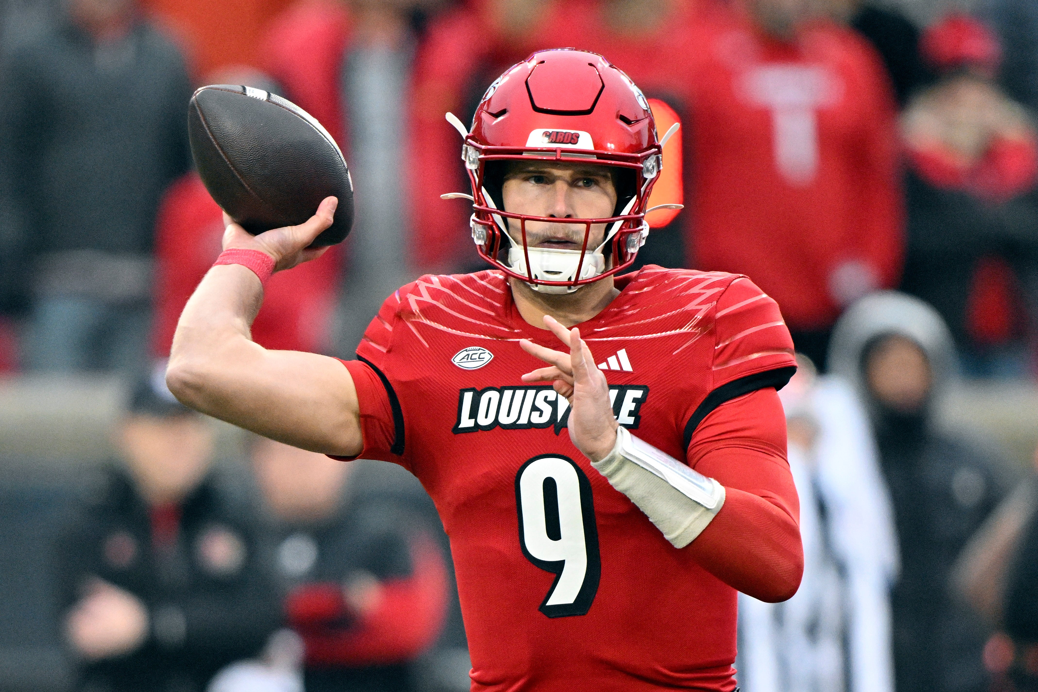 Tyler Shough, QB Louisville throwing a pass for the Cardinals in his final college football season