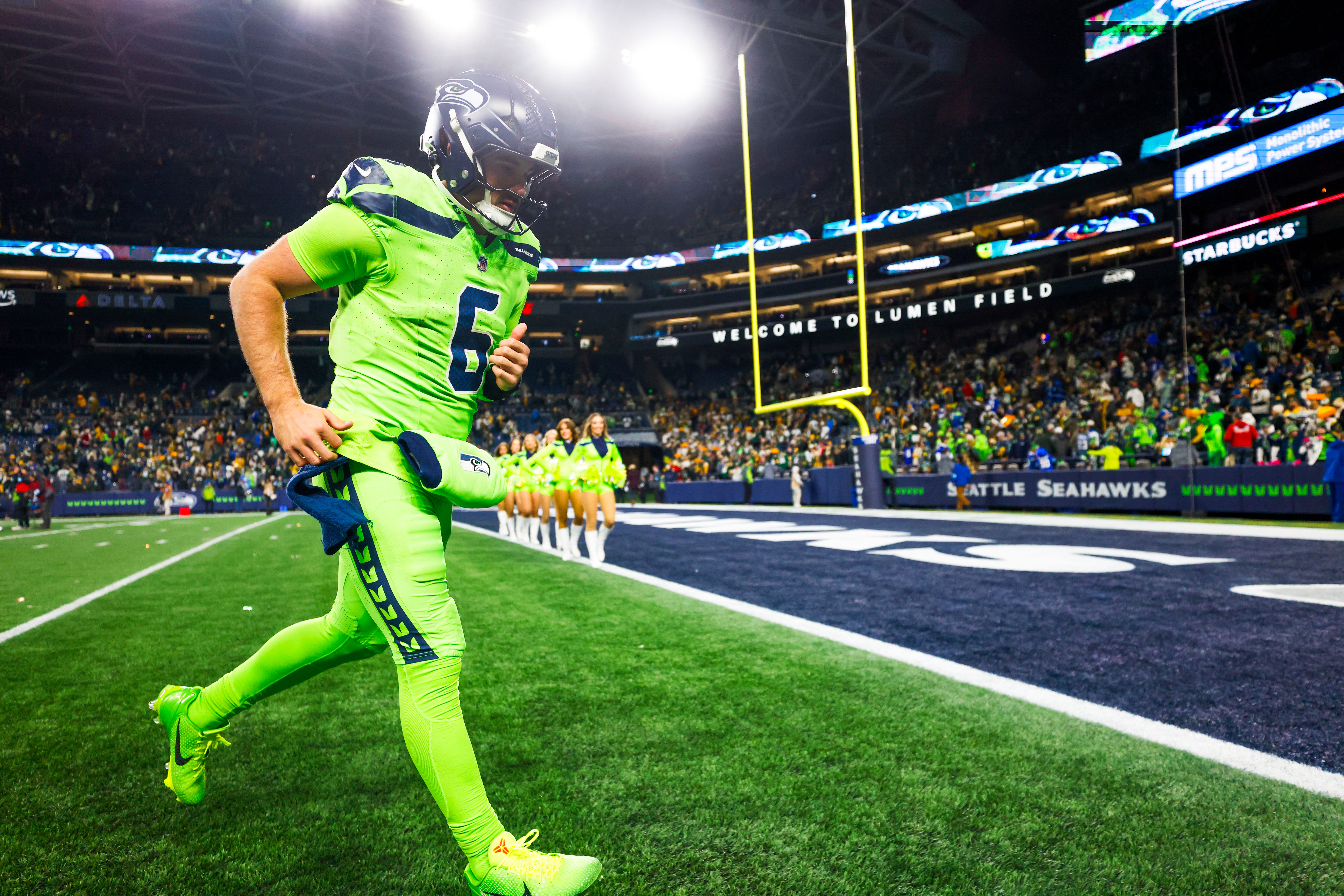 Dec 15, 2024; Seattle, Washington, USA; Seattle Seahawks quarterback Sam Howell (6) jogs to the locker room following a loss against the Green Bay Packers at Lumen Field.