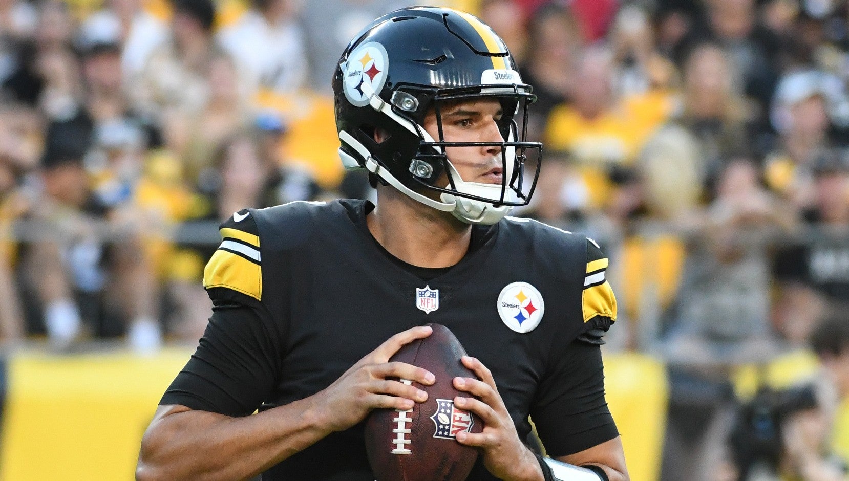 Aug 28, 2022; Pittsburgh, Pennsylvania, USA; Pittsburgh Steelers quarterback Mason Rudolph (2) looks for a receiver against the Detroit Lions during the fourth quarter at Acrisure Stadium.