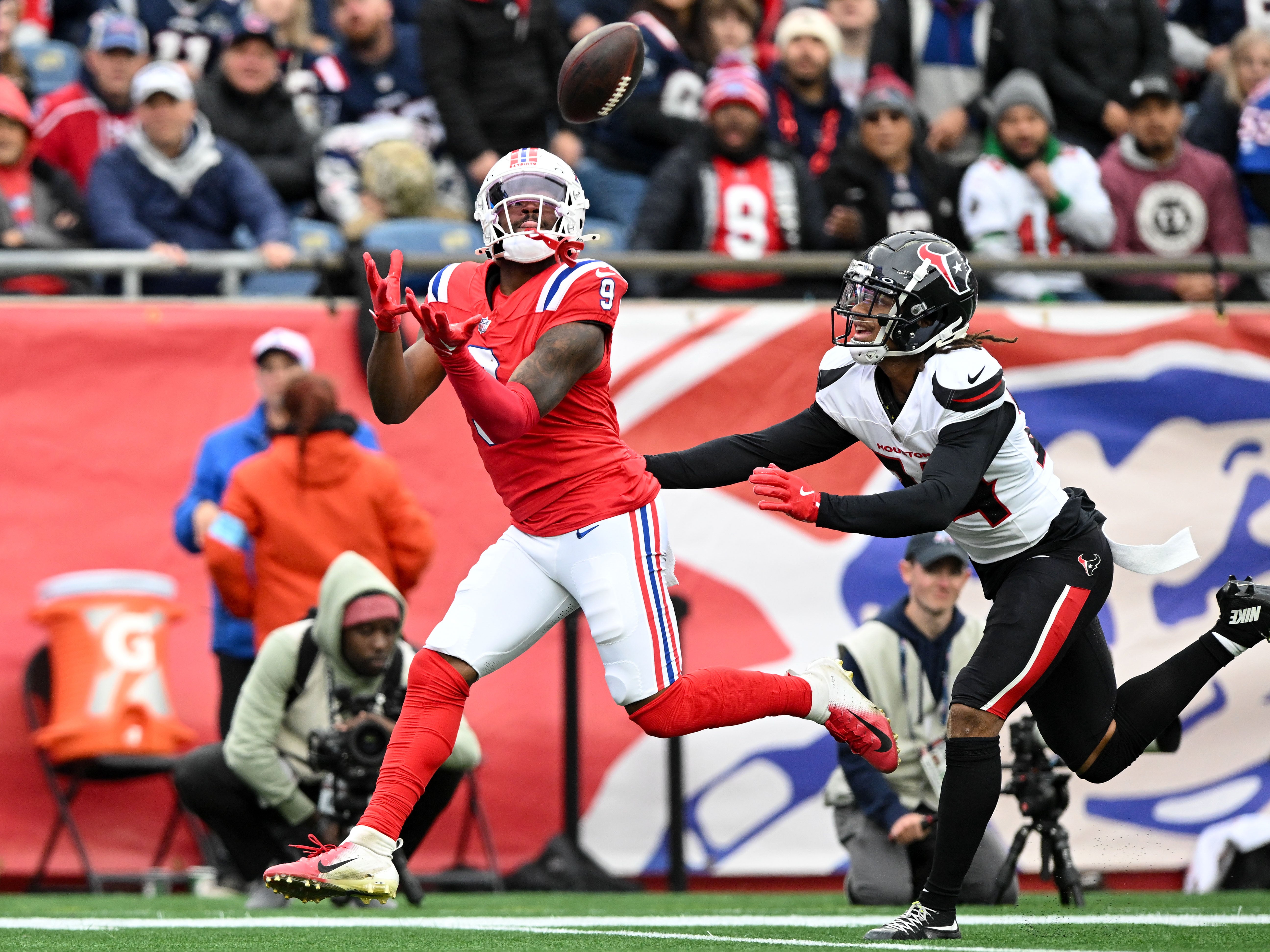 Oct 13, 2024; Foxborough, Massachusetts, USA; New England Patriots wide receiver Kayshon Boutte (9) scores a touchdown against the Houston Texans during the first half at Gillette Stadium