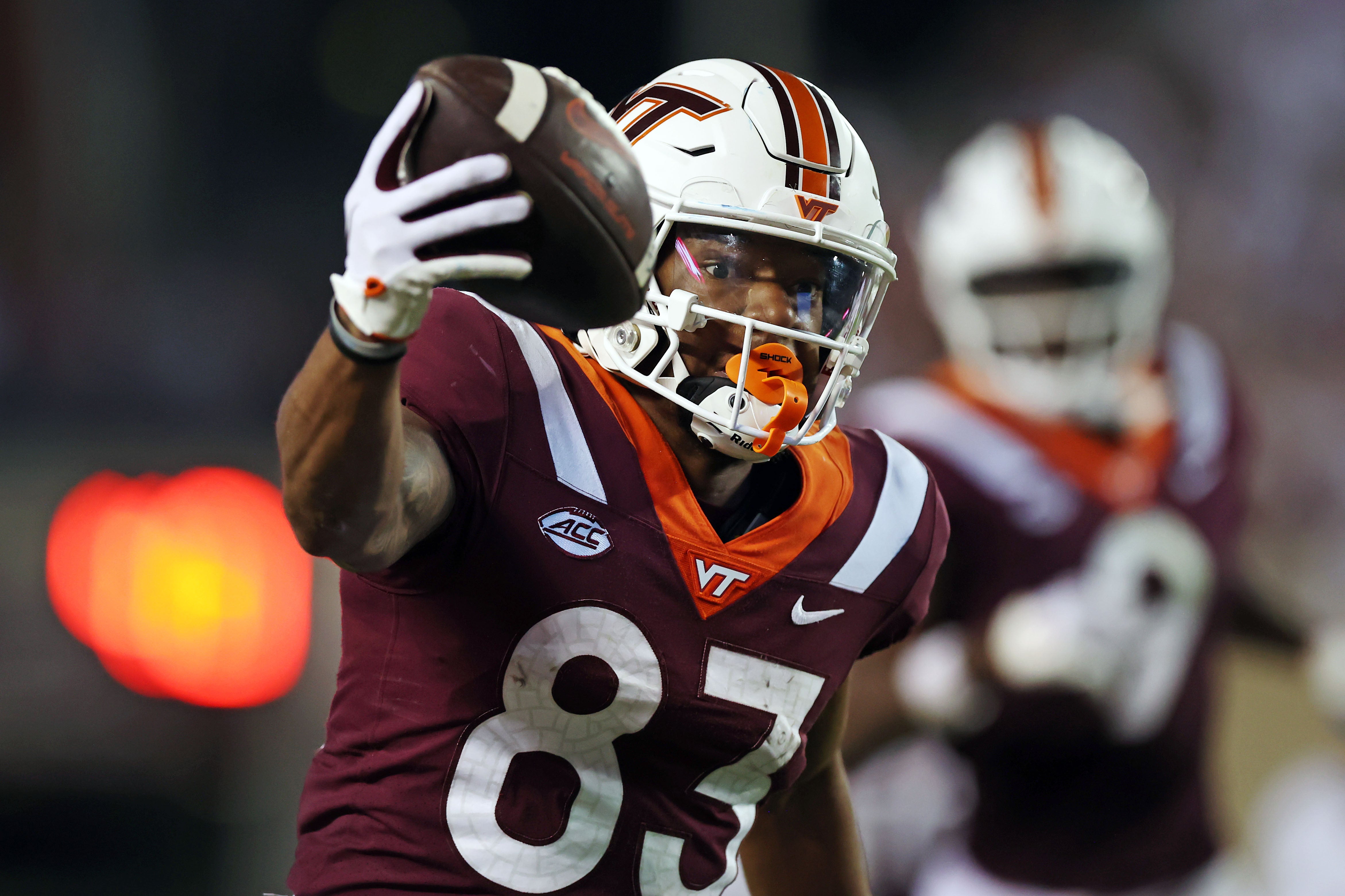 Sep 30, 2023; Blacksburg, Virginia, USA; Virginia Tech Hokies wide receiver Jaylin Lane (83) scores a touchdown during the third quarter against the Pittsburgh Panthers at Lane Stadium.