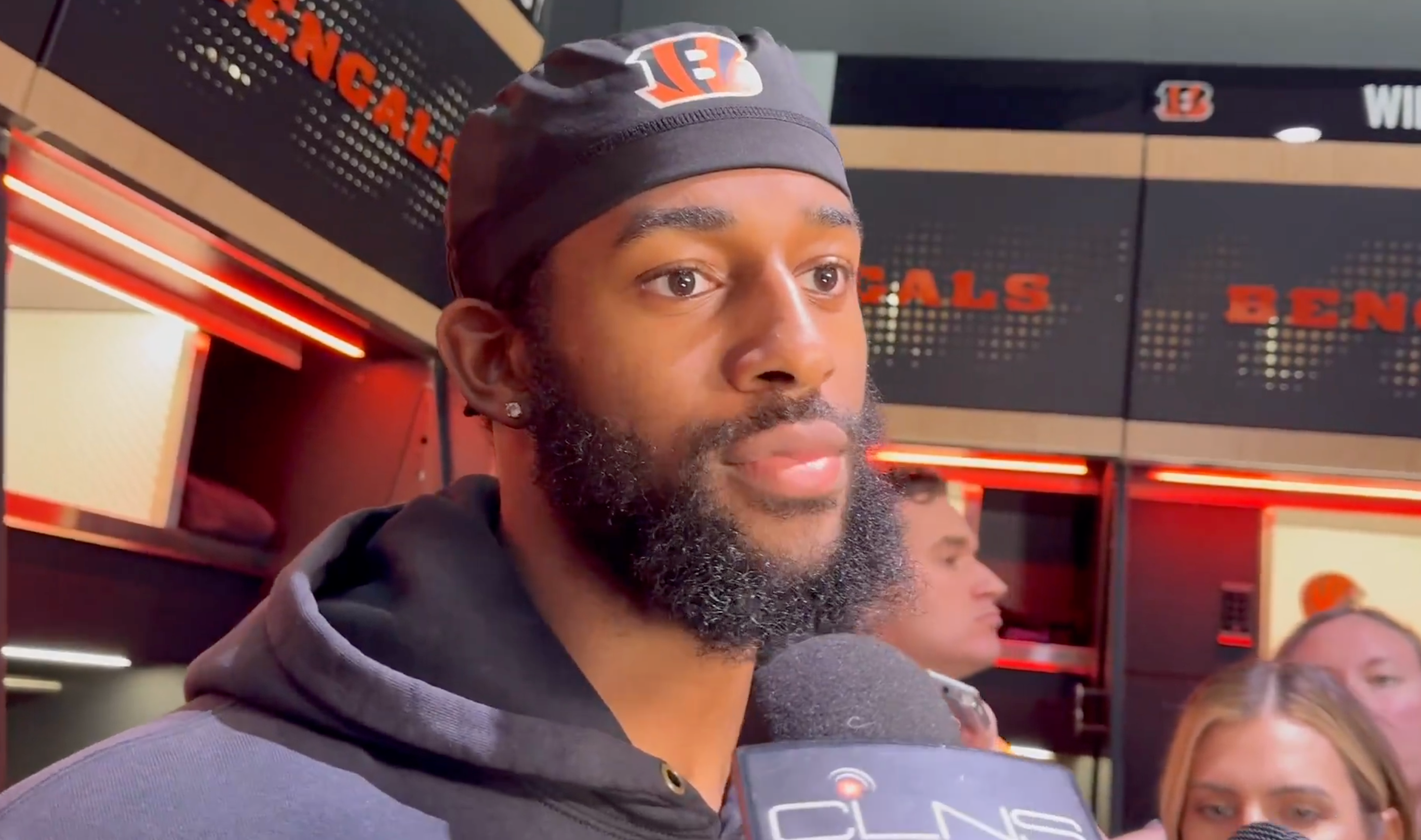 Cincinnati Bengals cornerback Dax Hill talks to reporters during first day of voluntary workouts on April 21, 2025.
