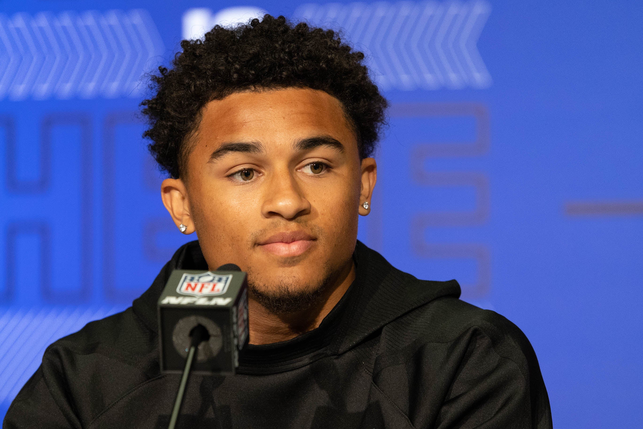 Mar 5, 2022; Indianapolis, IN, USA; Washington defensive back Trent McDuffie (DB26) talks to the media during the 2022 NFL Scouting Combine at Lucas Oil Stadium.