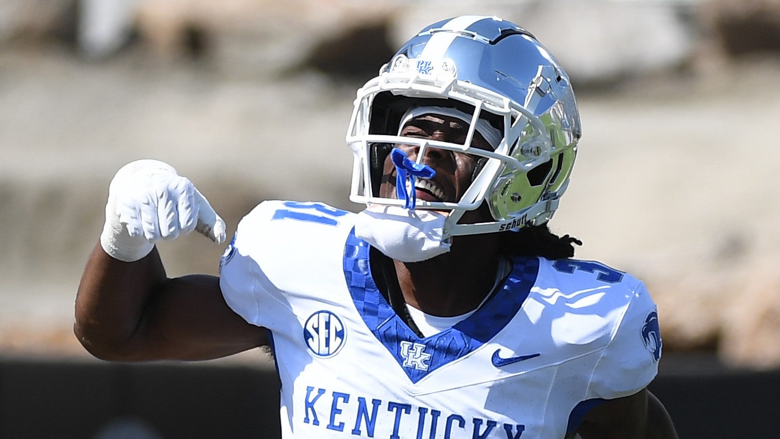 Sep 23, 2023; Nashville, Tennessee, USA; Kentucky Wildcats defensive back Maxwell Hairston (31) celebrates after returning an interception for a touchdown against the Vanderbilt Commodores during the first half at FirstBank Stadium.