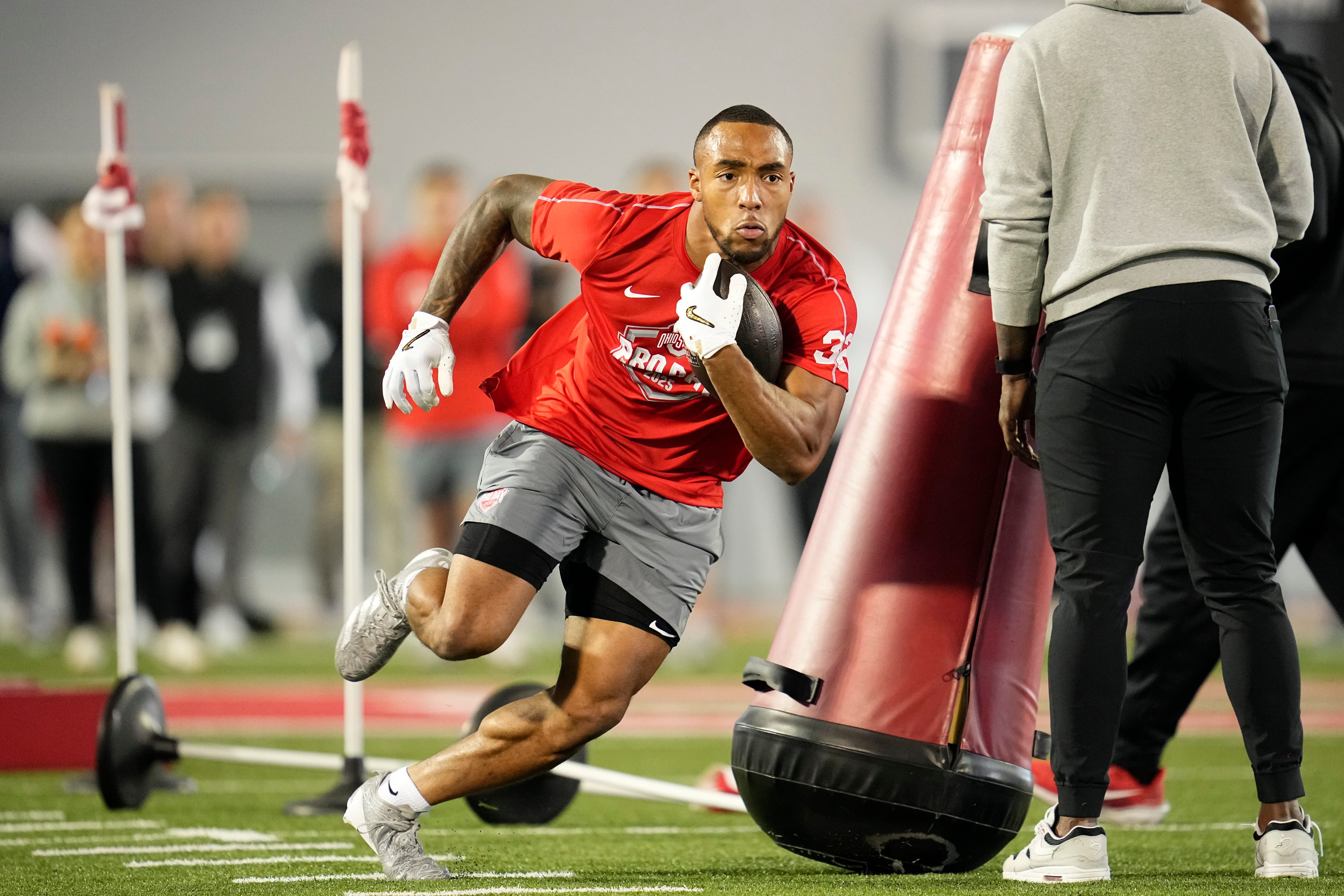 Ohio State Buckeyes running back TreVeyon Henderson works out during the pro day for NFL scouts at the Woody Hayes Athletic Cente on March 26, 2025.