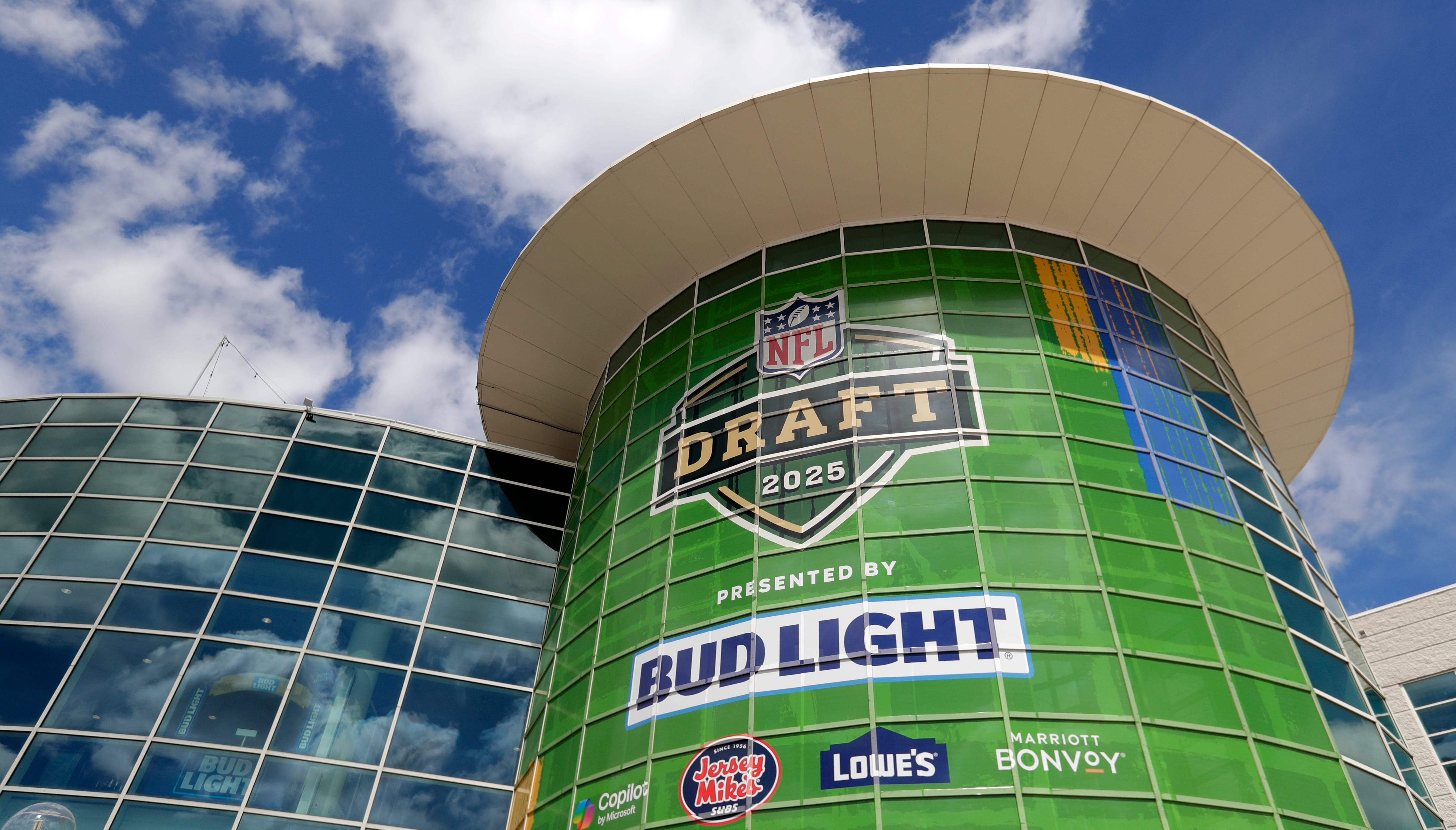 A sign promoting the 2025 NFL Draft is displayed on the Resch Center on April 19, 2025, in Ashwaubenon, Wis.
