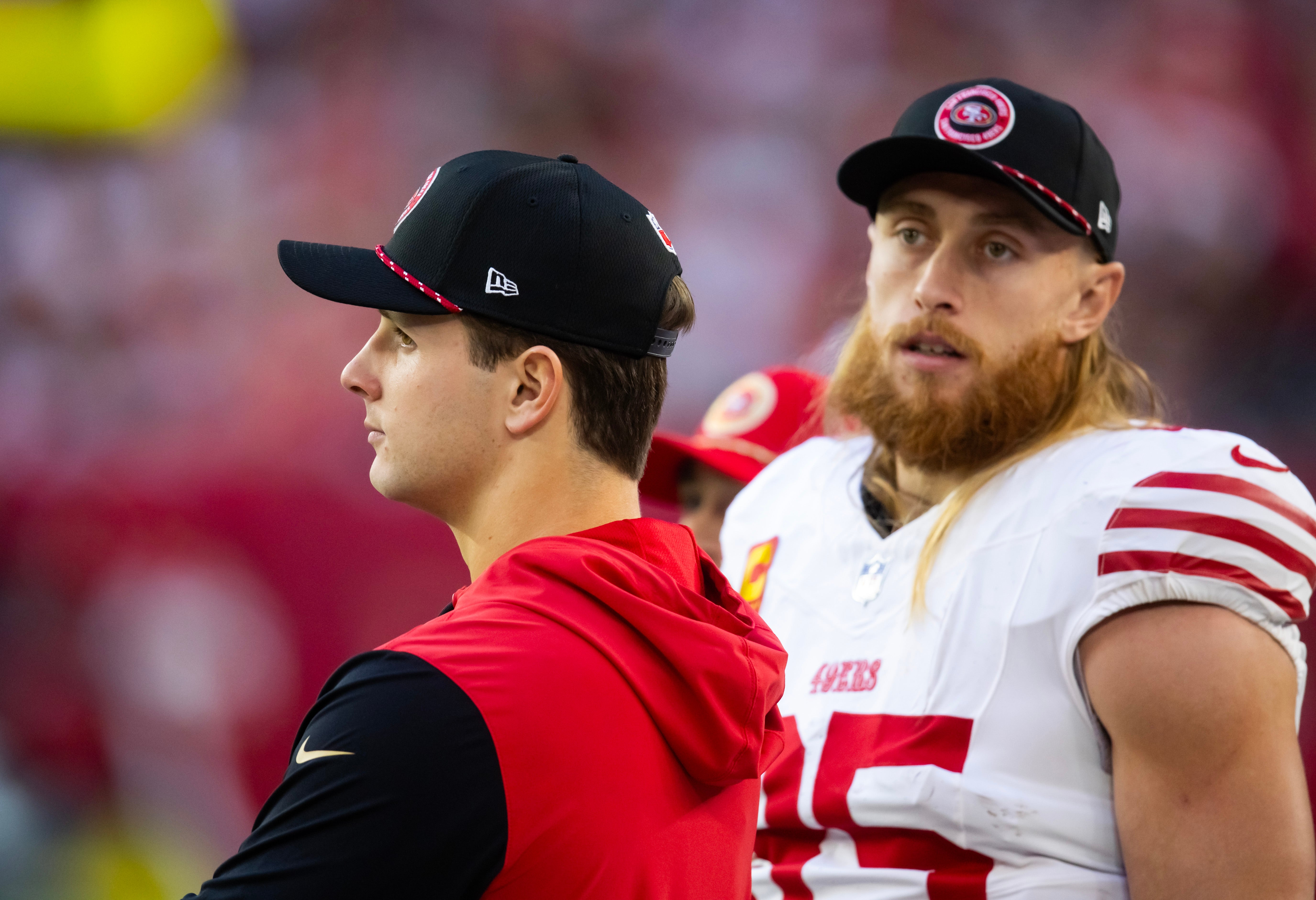 Jan 5, 2025; Glendale, Arizona, USA; San Francisco 49ers quarterback Brock Purdy (left) with tight end George Kittle (85) against the Arizona Cardinals at State Farm Stadium.