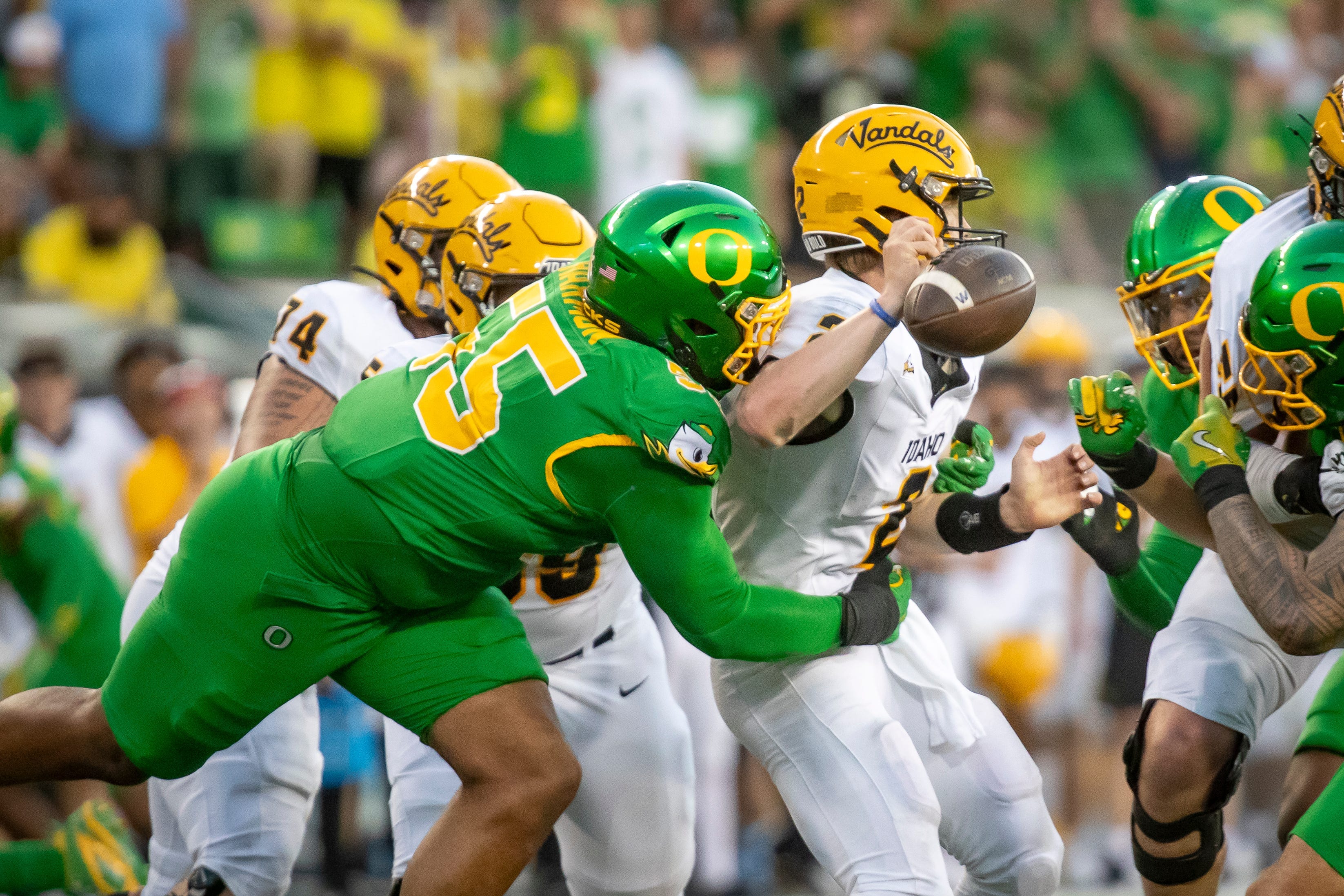Oregon Ducks defensive lineman Derrick Harmon forces a fumble from Idaho Vandals quarterback Jack Layne as the Oregon Ducks host the Idaho Vandals Saturday, Aug. 31, 2024, at Autzen Stadium in Eugene, Ore.