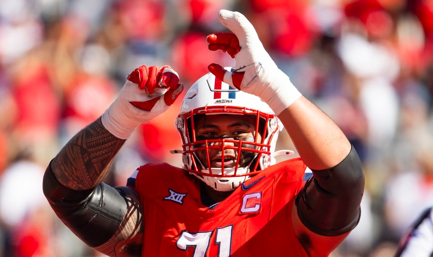 Oct 19, 2024; Tucson, Arizona, USA; Arizona Wildcats offensive lineman Jonah Savaiinaea (71) against the Colorado Buffalos at Arizona Stadium.