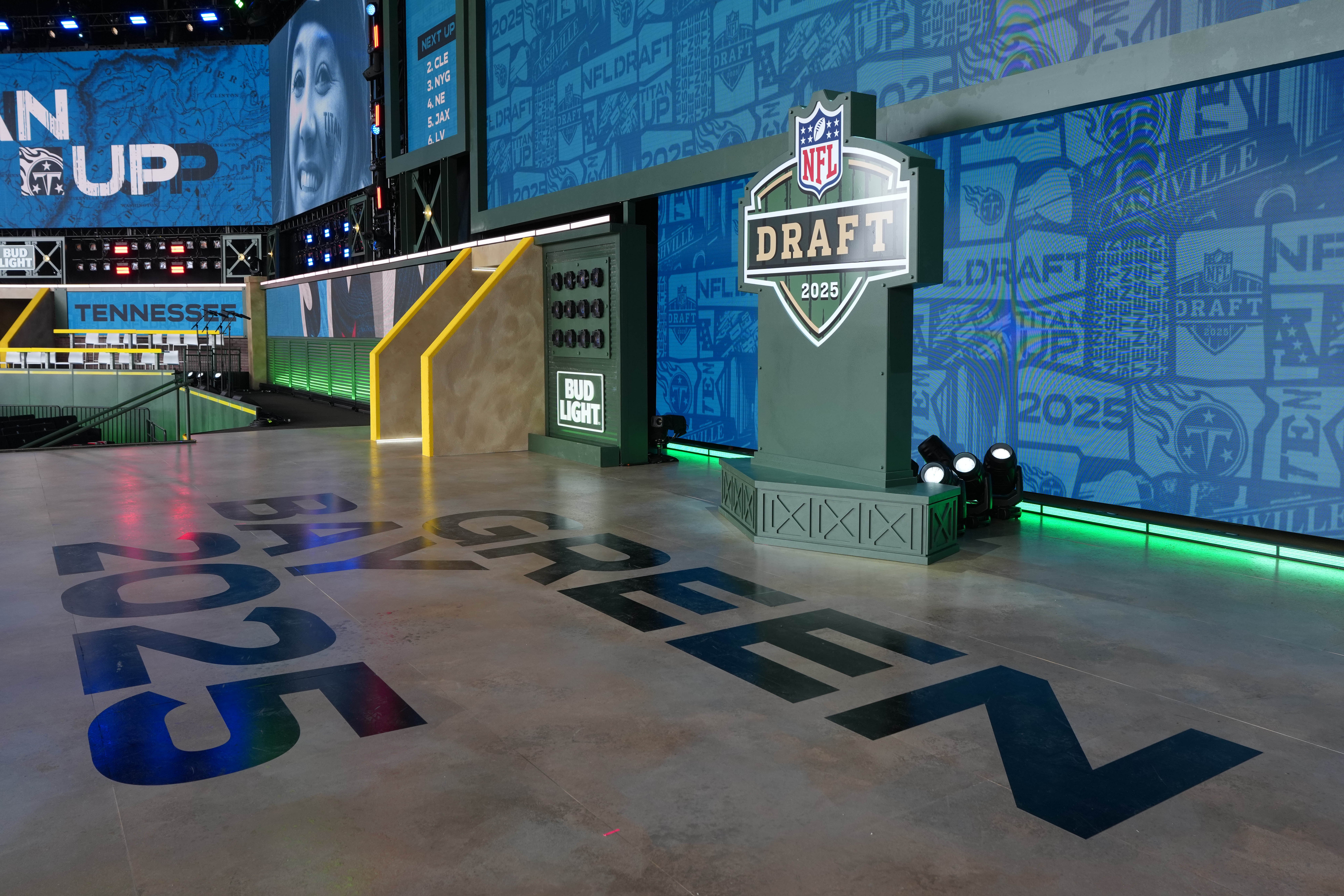 Apr 24, 2025; Green Bay, WI, USA; The Green Bay 2025 logo on the main stage before the NFL Draft at Lambeau Field.