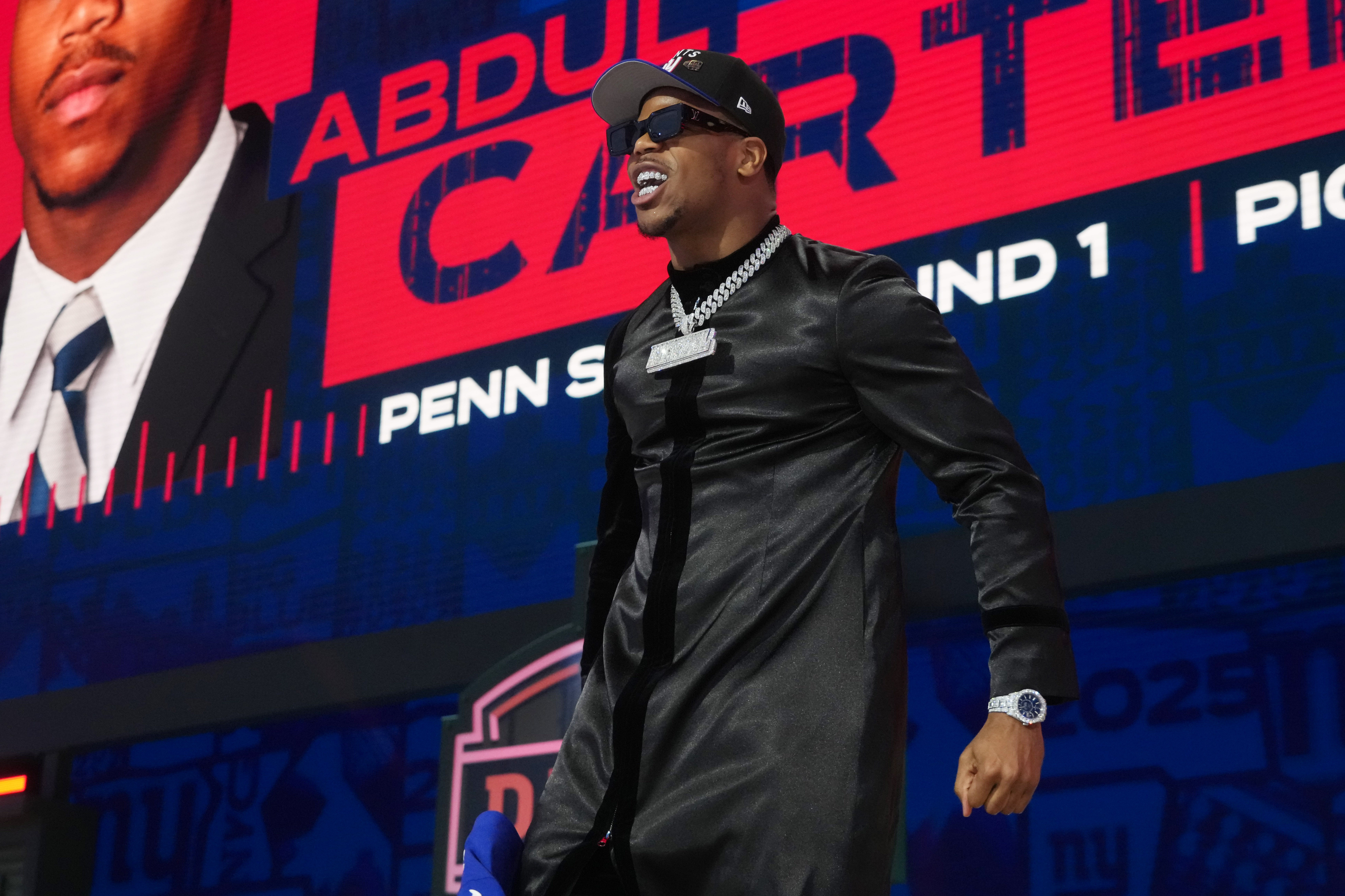 Apr 24, 2025; Green Bay, WI, USA; Penn State Nittany Lions defensive end Abdul Carter is selected by the New York Giants as the number three pick in the first round of the 2025 NFL Draft at Lambeau Field.