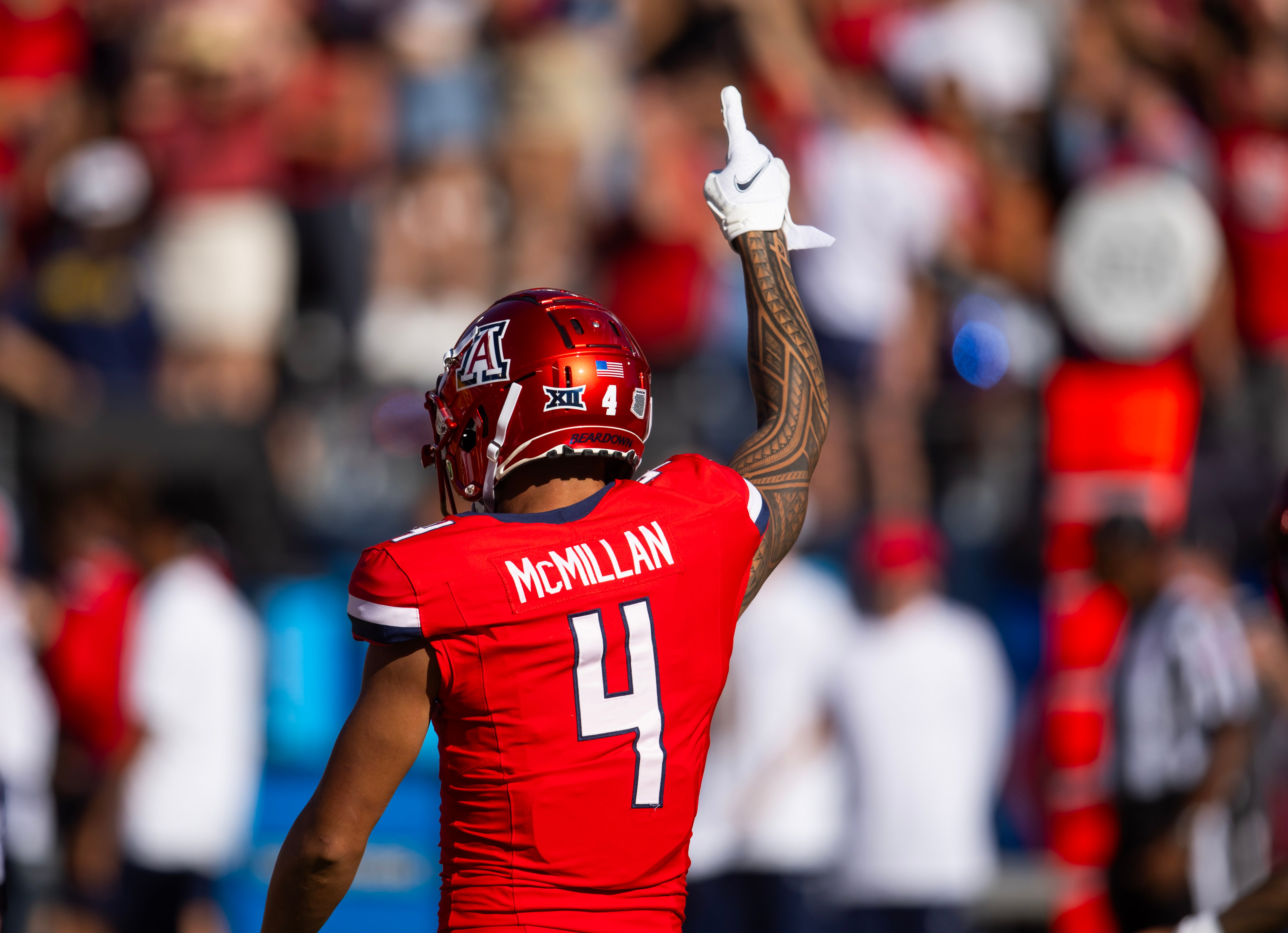 Nov 30, 2024; Tucson, Arizona, USA; Detailed view of the jersey of Arizona Wildcats wide receiver Tetairoa McMillan (4) against the Arizona State Sun Devils during the Territorial Cup at Arizona Stadium. Mandatory Credit: Mark J. Rebilas-Imagn Images  