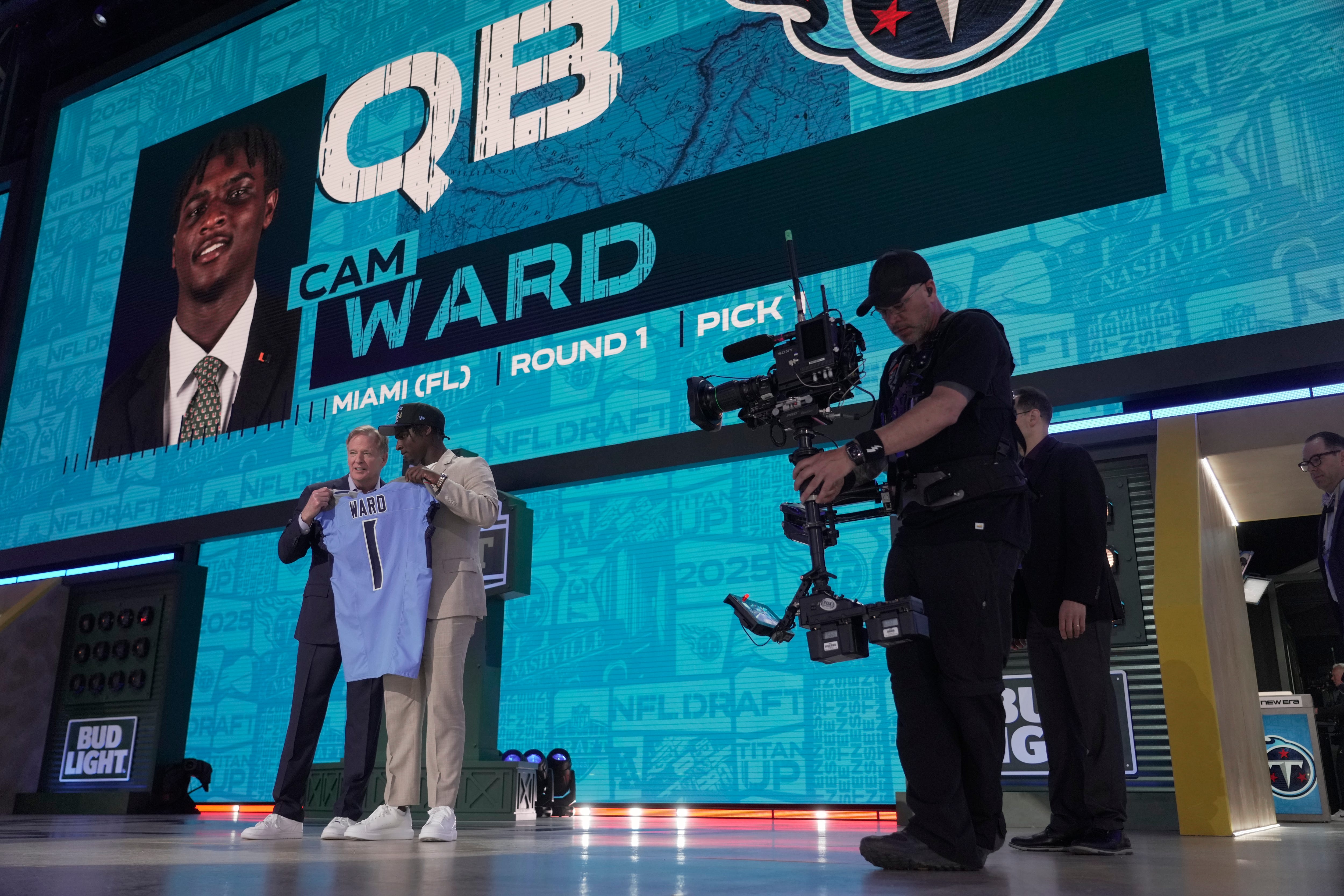 Quarterback Cam Ward from Miami poses with NFL Commissioner Roger Goodell after being selected 1st overall by the Tennessee Titans during the first round of the 2025 NFL Draft at Lambeau Field on Apri... Mark Hoffman / Milwaukee Journal Sentinel-USA TODAY NETWORK via Imagn Images