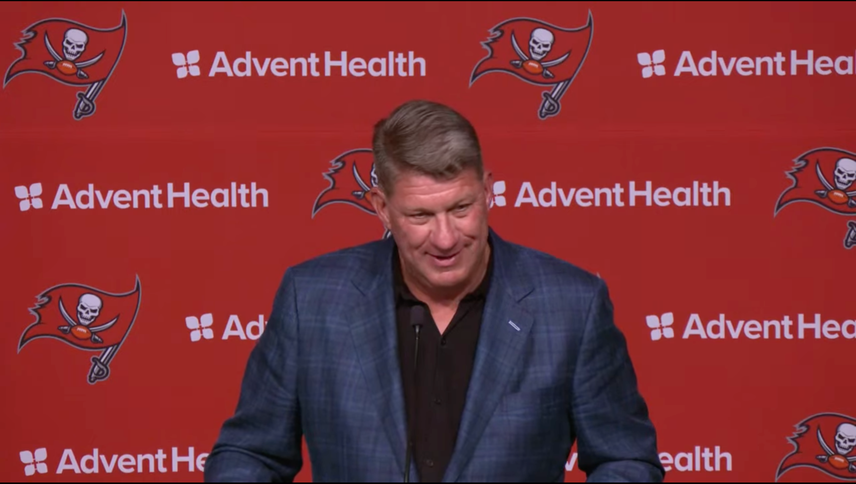Jason Licht talks with reporters after the Bucs drafted Emeka Egbuka in Round 1 of the 2025 NFL Draft.