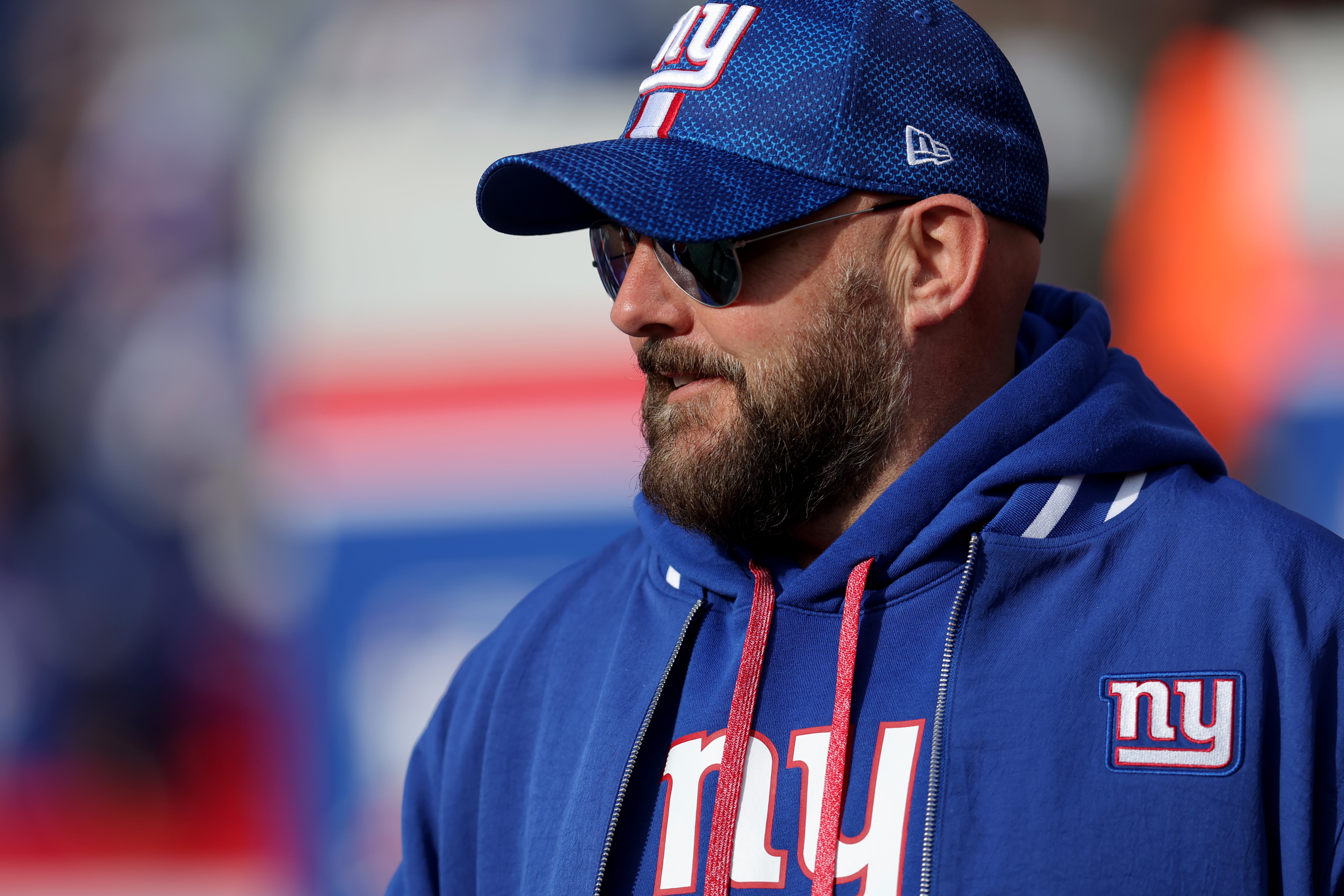Dec 8, 2024; East Rutherford, New Jersey, USA; New York Giants head coach Brian Daboll walks onto the field before a game against the New Orleans Saints at MetLife Stadium.